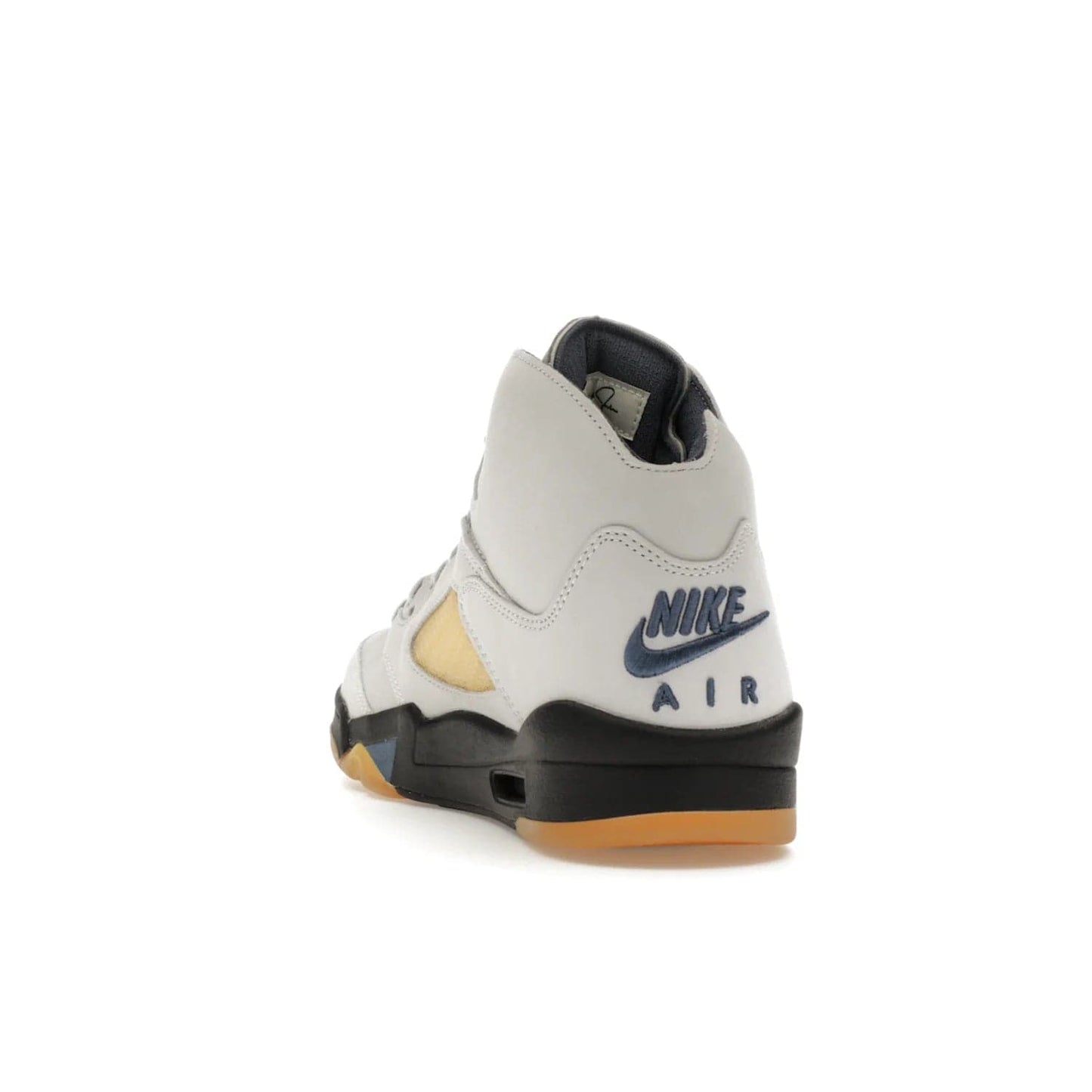 Jordan 5 Retro A Ma Maniére Dawn (Women's) - Image 26 - Only at www.BallersClubKickz.com - Catch the exclusive Air Jordan 5 Retro A Ma Maniére "Dawn" – a modern classic that combines elegance and street style. Get a gleaming metallic silver tongue, the iconic "23" heel, and signature shark teeth pattern. A Photon Dust/Black/Diffused Blue/Pale Ivory colorway, slimmed-down collar, and pre-yellowed quarter panel netting make this sneaker a must-have. Get your pair on November 17 and seize