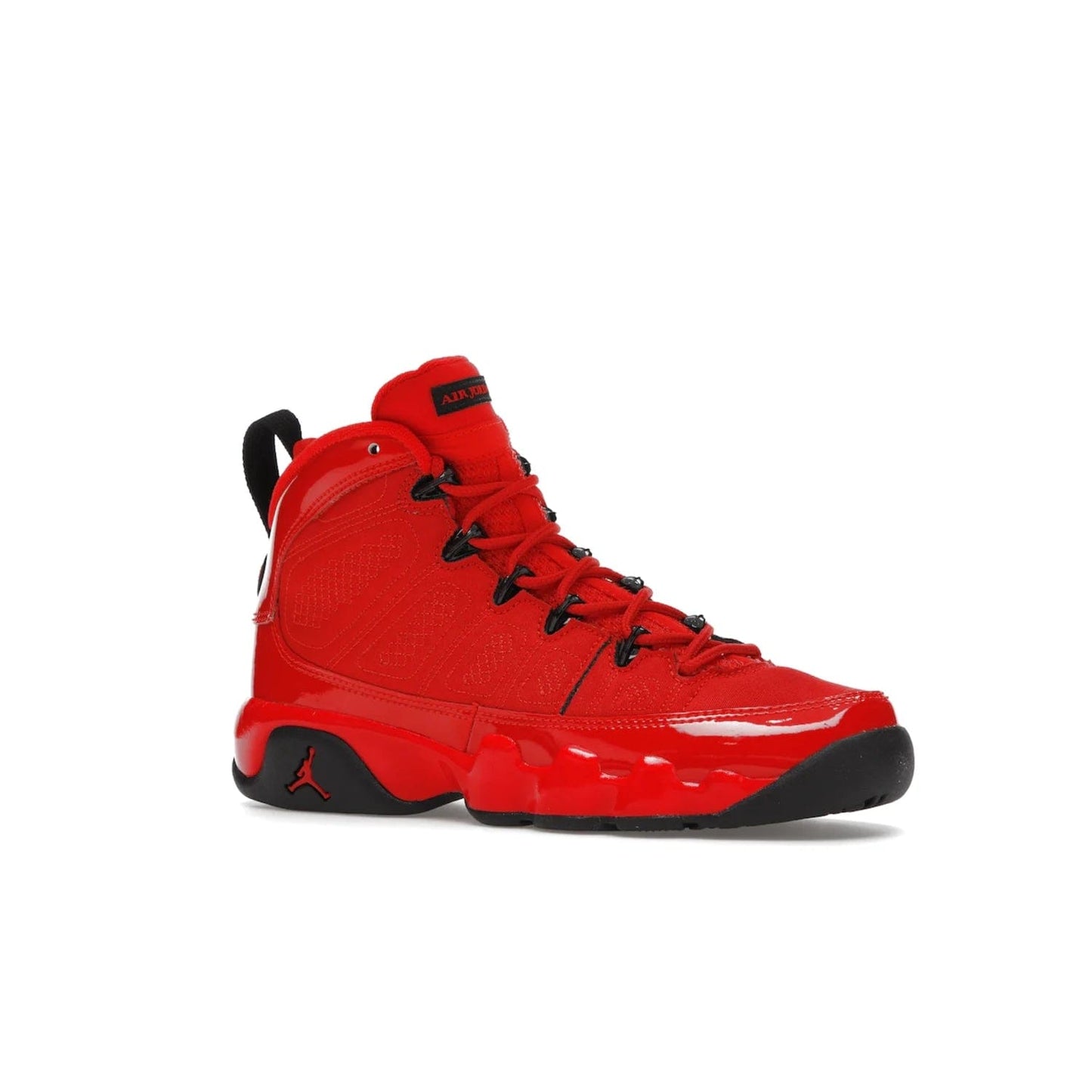 Jordan 9 Retro Chile Red (GS) - Image 4 - Only at www.BallersClubKickz.com - Introducing the Air Jordan 9 Retro Chile Red (GS), a vintage 1993 silhouette with fiery colorway. Features quilted side paneling, glossy patent leather, pull tabs, black contrast accents, and foam midsole. Launching May 2022 for $140.