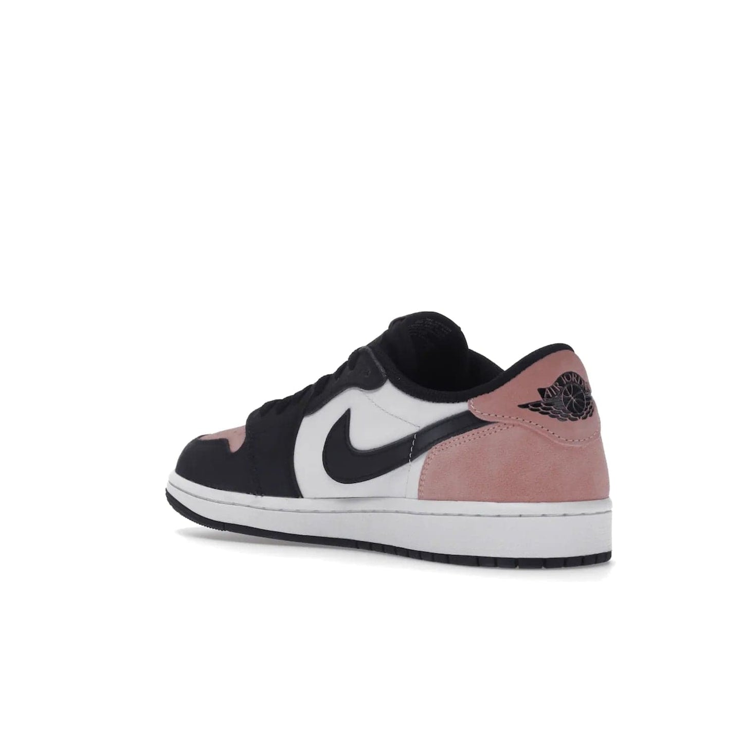 Jordan 1 Low OG Bleached Coral - Image 24 - Only at www.BallersClubKickz.com - Introducing the Air Jordan 1 Low OG Bleached Coral. Constructed with white leather, black cracked leather & Bleached Coral suede. Signature Jordan Wings logo, white Air sole. Get the pack in July 2022 and stand out.