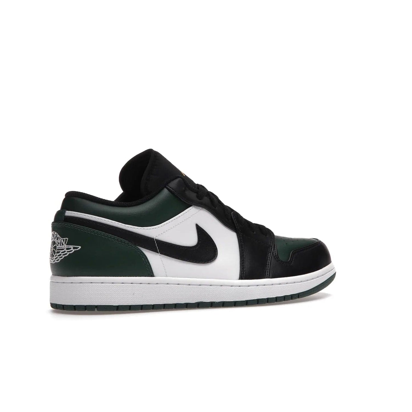 Jordan 1 Low Green Toe - Image 34 - Only at www.BallersClubKickz.com - The Jordan 1 Low Green Toe features white, black and Noble Green leather with black Swoosh. Get the classic Bred Toe-inspired color blocking with green perforated toe box. White and green Air sole completes the design. Released in October 2021 at only $100. Grab your pair now!