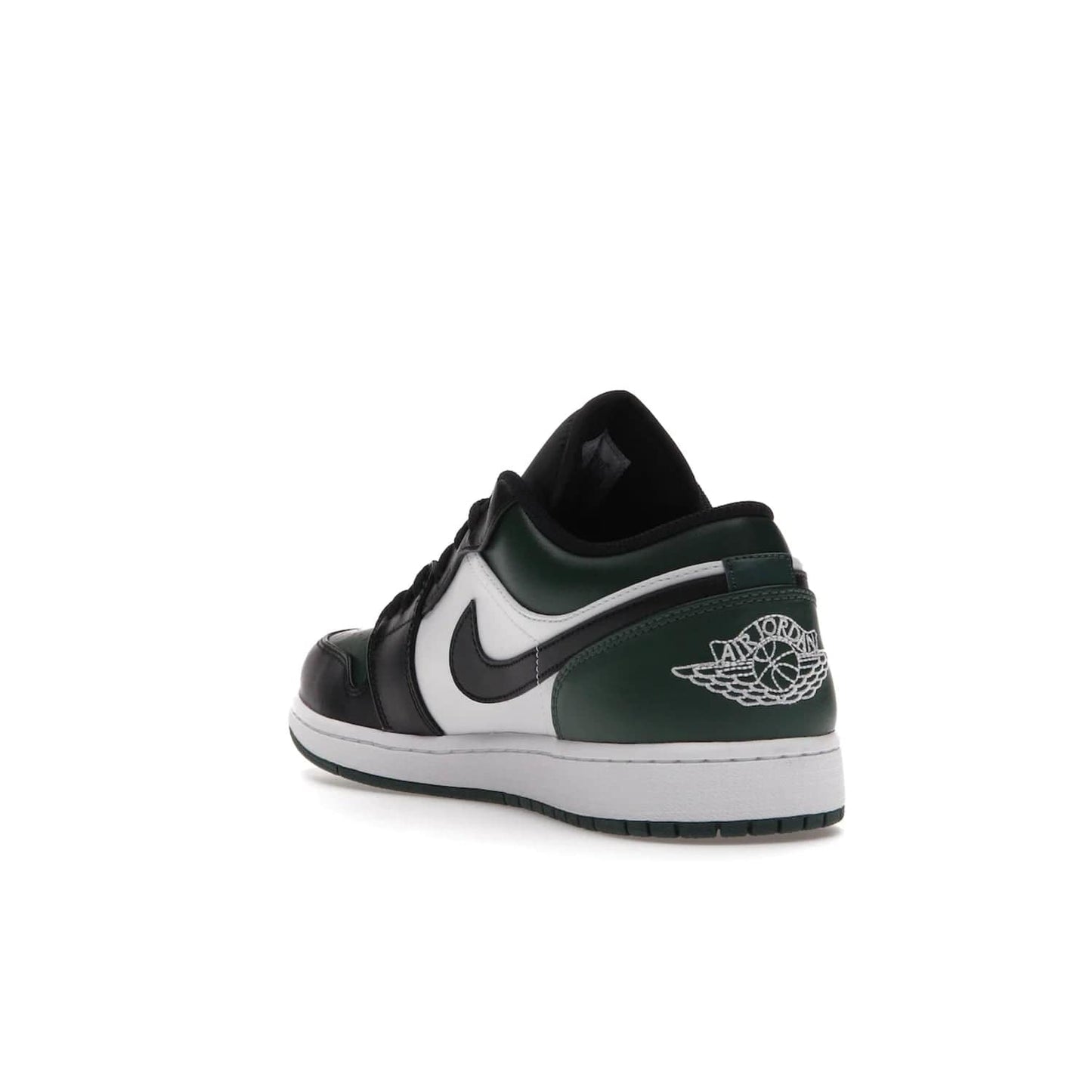 Jordan 1 Low Green Toe - Image 25 - Only at www.BallersClubKickz.com - The Jordan 1 Low Green Toe features white, black and Noble Green leather with black Swoosh. Get the classic Bred Toe-inspired color blocking with green perforated toe box. White and green Air sole completes the design. Released in October 2021 at only $100. Grab your pair now!