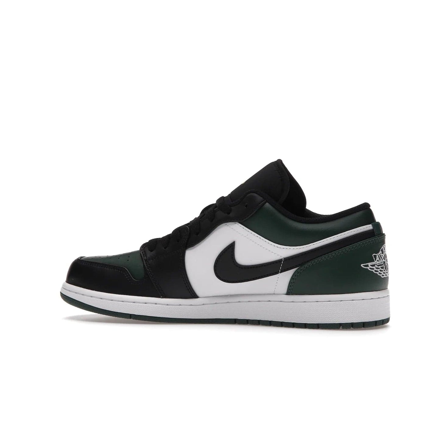 Jordan 1 Low Green Toe - Image 21 - Only at www.BallersClubKickz.com - The Jordan 1 Low Green Toe features white, black and Noble Green leather with black Swoosh. Get the classic Bred Toe-inspired color blocking with green perforated toe box. White and green Air sole completes the design. Released in October 2021 at only $100. Grab your pair now!