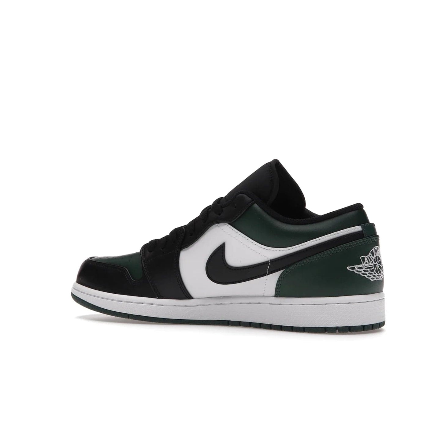 Jordan 1 Low Green Toe - Image 22 - Only at www.BallersClubKickz.com - The Jordan 1 Low Green Toe features white, black and Noble Green leather with black Swoosh. Get the classic Bred Toe-inspired color blocking with green perforated toe box. White and green Air sole completes the design. Released in October 2021 at only $100. Grab your pair now!