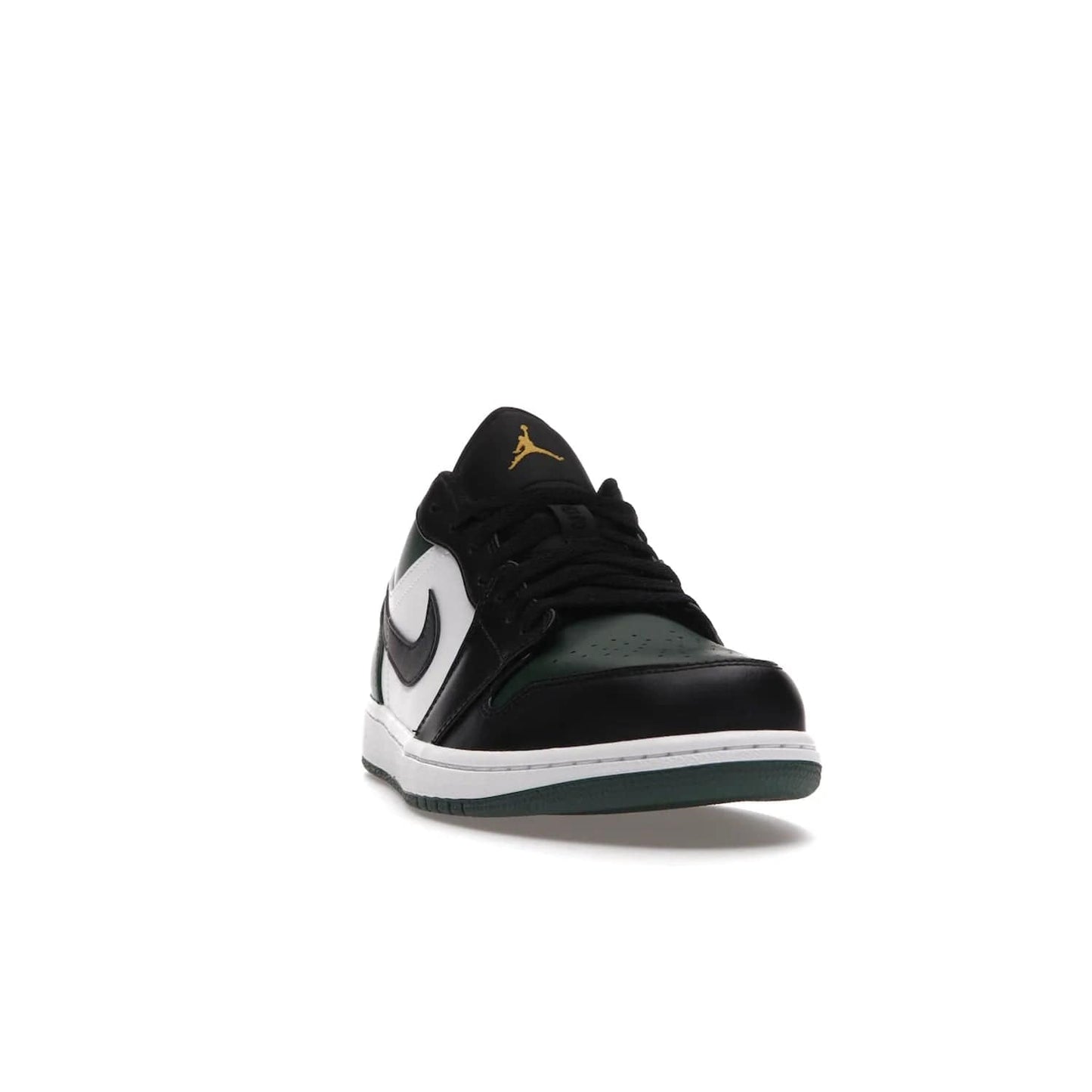 Jordan 1 Low Green Toe - Image 8 - Only at www.BallersClubKickz.com - The Jordan 1 Low Green Toe features white, black and Noble Green leather with black Swoosh. Get the classic Bred Toe-inspired color blocking with green perforated toe box. White and green Air sole completes the design. Released in October 2021 at only $100. Grab your pair now!