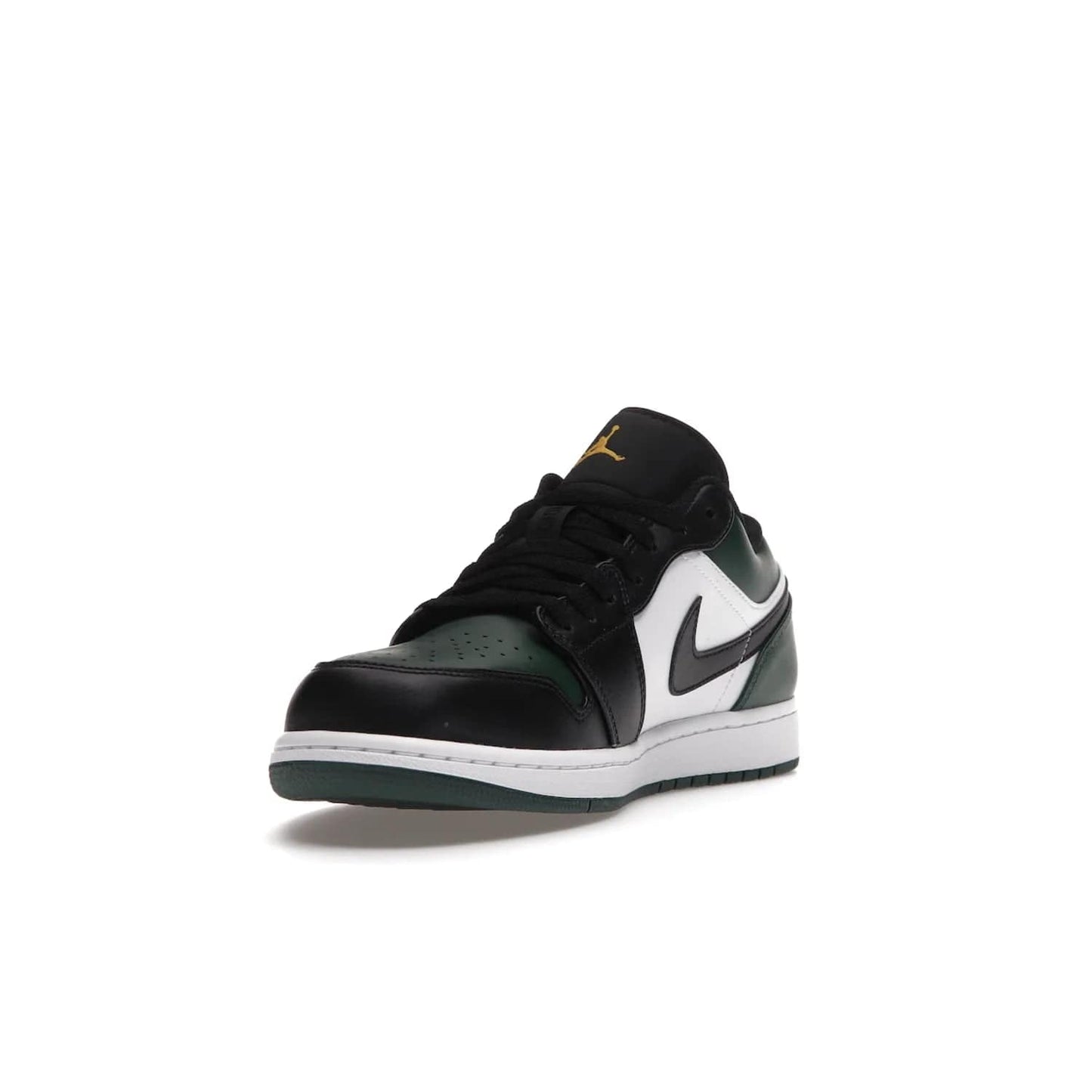 Jordan 1 Low Green Toe - Image 13 - Only at www.BallersClubKickz.com - The Jordan 1 Low Green Toe features white, black and Noble Green leather with black Swoosh. Get the classic Bred Toe-inspired color blocking with green perforated toe box. White and green Air sole completes the design. Released in October 2021 at only $100. Grab your pair now!