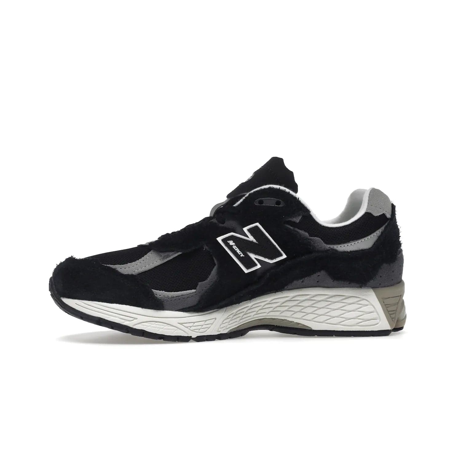 New Balance 2002R Protection Pack Black Grey - Image 18 - Only at www.BallersClubKickz.com - Look stylish in the New Balance 2002R Protection Pack Black Grey. Uppers constructed from premium materials like mesh and synthetic overlays. Iconic "N" emblem appears in white and black. ABZORB midsole for shock absorption and responsiveness. Black outsole for grip and traction. Lacing system offers customized fit and cushioned tongue and collar offer comfort and stability. Step up your style with this must-hav