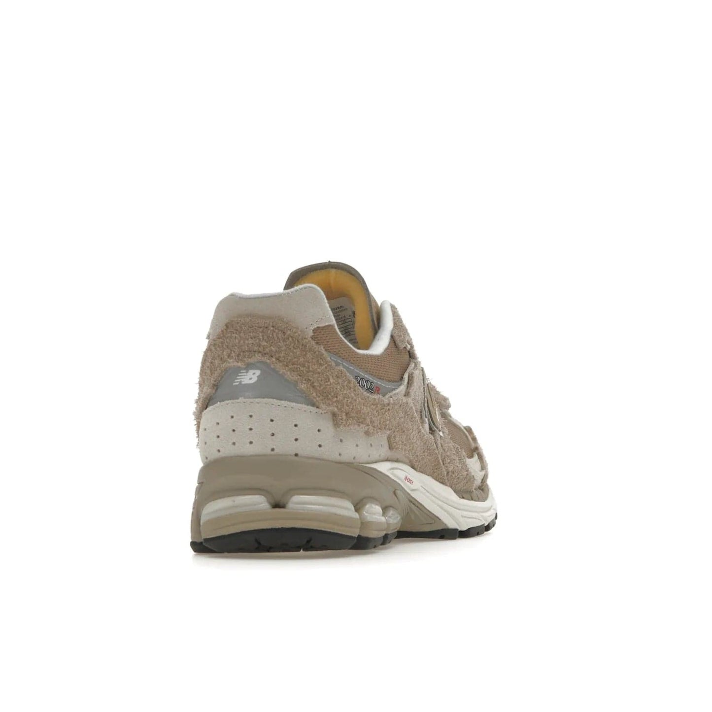 New Balance 2002R Protection Pack Driftwood - Image 30 - Only at www.BallersClubKickz.com - The New Balance 2002R Driftwood Protection Pack is a fashionable yet comfortable sneaker perfect for any occasion. Features include hairy suede uppers, breathable mesh, underfoot support, 3M reflective details, and more. Stylishly dress up your look with this shoe, available March 2023.