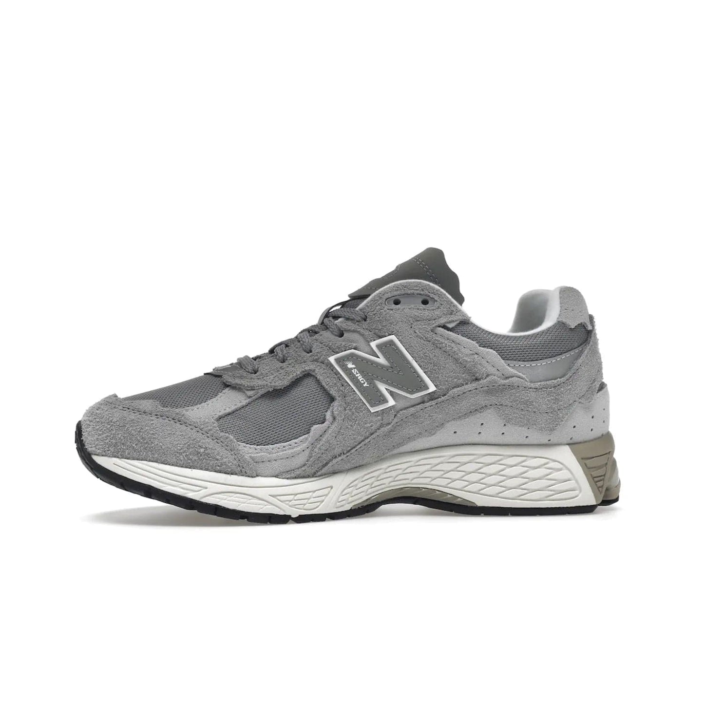 New Balance 2002R Protection Pack Grey - Image 18 - Only at www.BallersClubKickz.com - The New Balance 2002R Protection Pack Grey provides superior protection and all-day comfort. It features a blend of synthetic and mesh materials, foam midsole, rubber outsole, and a toe cap and heel counter. Show off the classic "N" logo and "2002R" lettering. Get a pair on February 14, 2023 for protection and style.