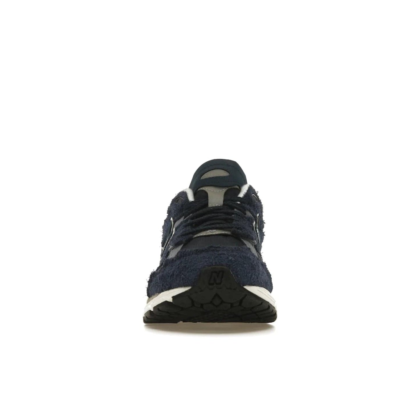 New Balance 2002R Protection Pack Navy Grey - Image 10 - Only at www.BallersClubKickz.com - Get the New Balance 2002R Protection Pack Navy Grey for a statement look. Crafted by Yue Wu, this sneaker features a mesh base, navy suede overlays, and a white and earth midsole. Released Feb 14, 2023.