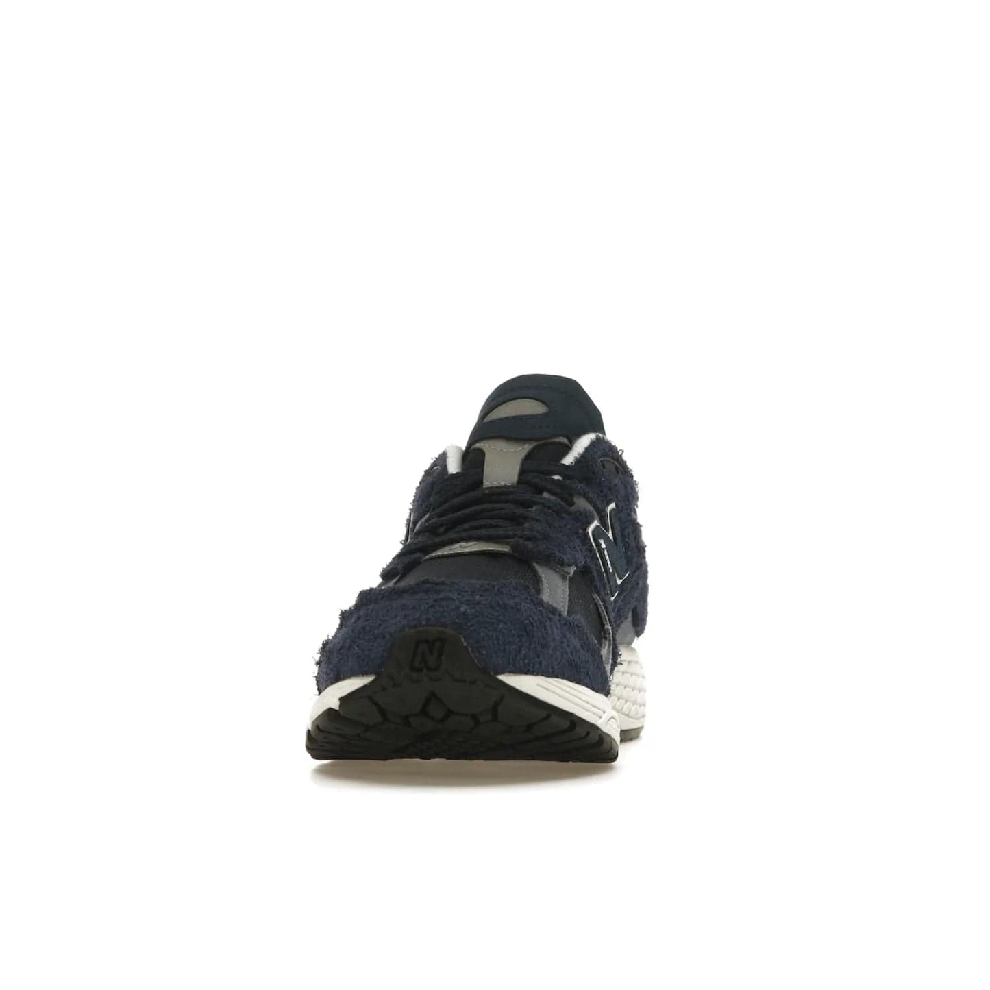 New Balance 2002R Protection Pack Navy Grey - Image 11 - Only at www.BallersClubKickz.com - Get the New Balance 2002R Protection Pack Navy Grey for a statement look. Crafted by Yue Wu, this sneaker features a mesh base, navy suede overlays, and a white and earth midsole. Released Feb 14, 2023.