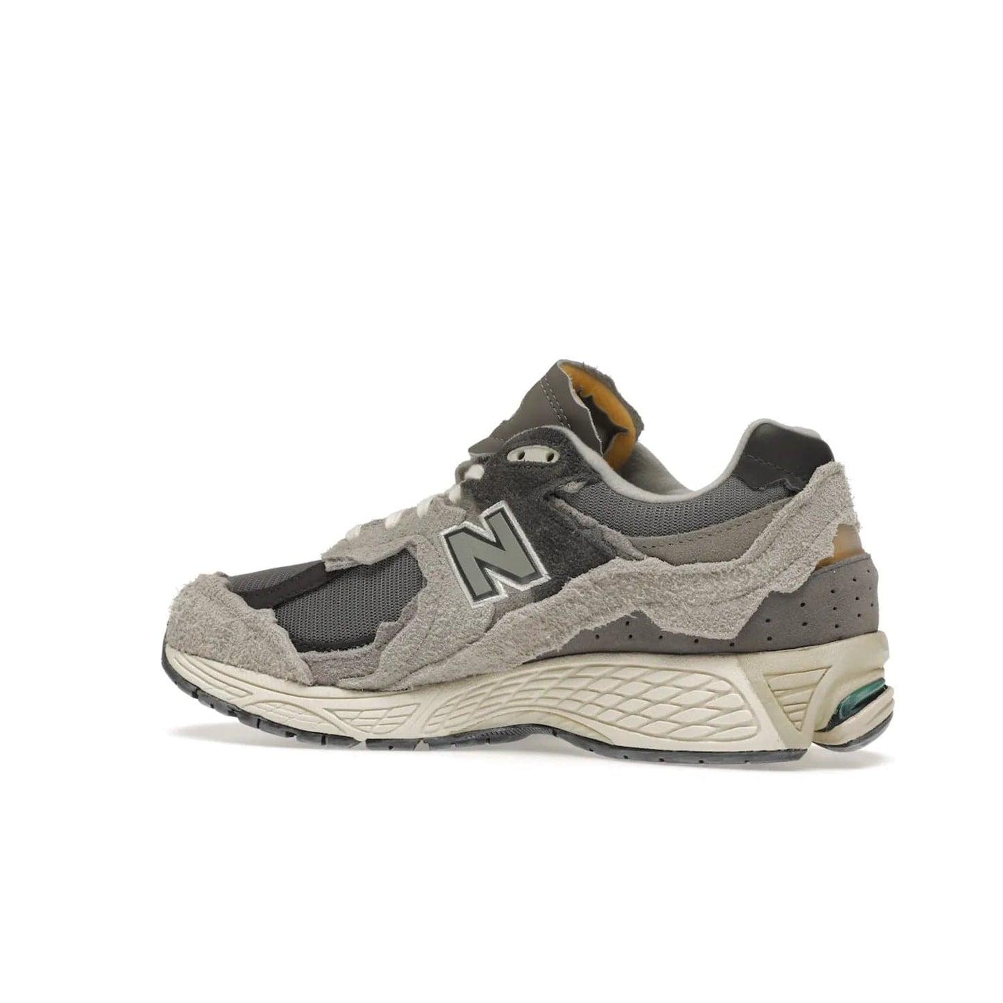 New Balance 2002R Protection Pack Rain Cloud - Image 22 - Only at www.BallersClubKickz.com - The New Balance 2002R Protection Pack Rain Cloud combines style and comfort. Featuring a grey mesh upper, jagged suede overlays and a reflective logo, a vibrant rain cloud motif on the heel stands out! Not just good-looking, the Nrgy midsole and soft grey outsole provide cushioning and comfort. Make a statement with the iconic New Balance 2002R Protection Pack Rain Cloud.