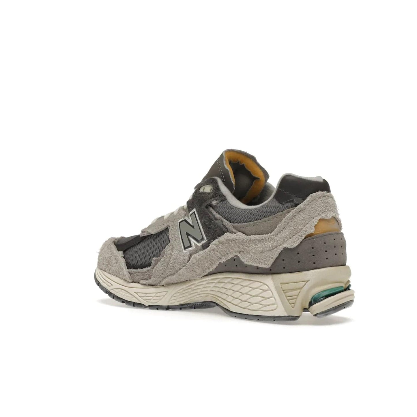 New Balance 2002R Protection Pack Rain Cloud - Image 24 - Only at www.BallersClubKickz.com - The New Balance 2002R Protection Pack Rain Cloud combines style and comfort. Featuring a grey mesh upper, jagged suede overlays and a reflective logo, a vibrant rain cloud motif on the heel stands out! Not just good-looking, the Nrgy midsole and soft grey outsole provide cushioning and comfort. Make a statement with the iconic New Balance 2002R Protection Pack Rain Cloud.