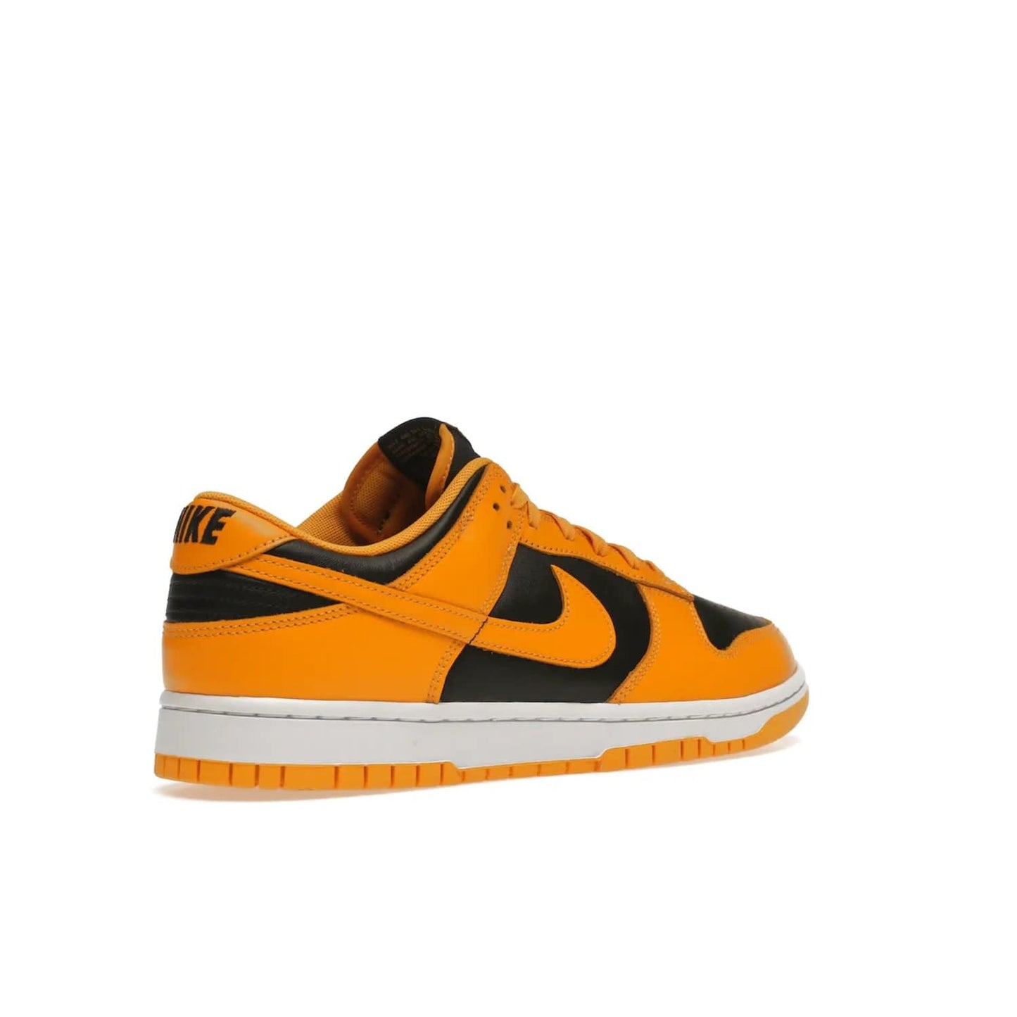 Nike Dunk Low Championship Goldenrod (2021) - Image 33 - Only at www.BallersClubKickz.com - Iconic silhouette Nike Dunk Low is back with a luxe look. Featuring a black upper, goldenrod overlays, and white and yellow Nike Air sole, this retro inspired design is perfect for the sneaker culture enthusiast. Releasing in December 2021 at $100.