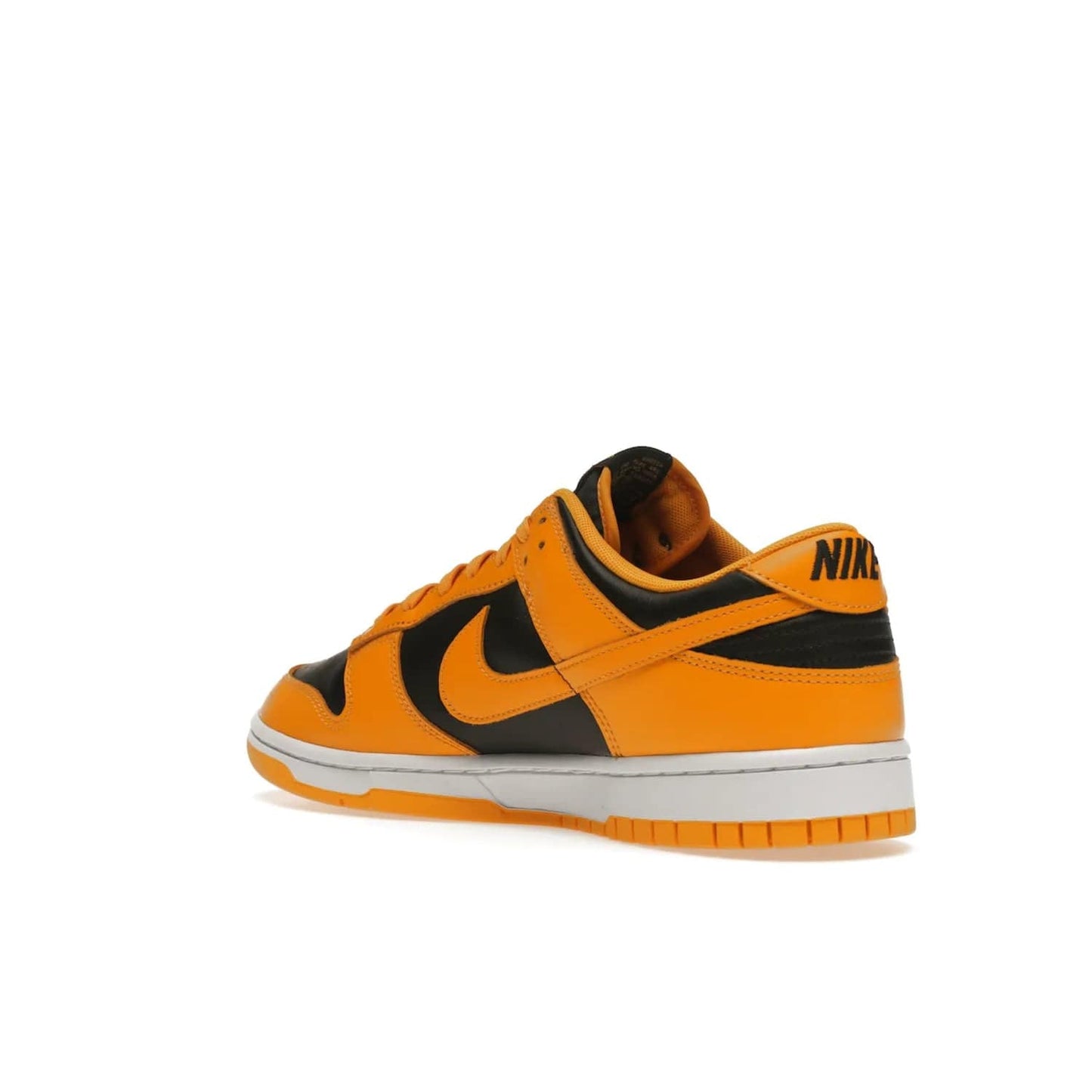 Nike Dunk Low Championship Goldenrod (2021) - Image 24 - Only at www.BallersClubKickz.com - Iconic silhouette Nike Dunk Low is back with a luxe look. Featuring a black upper, goldenrod overlays, and white and yellow Nike Air sole, this retro inspired design is perfect for the sneaker culture enthusiast. Releasing in December 2021 at $100.