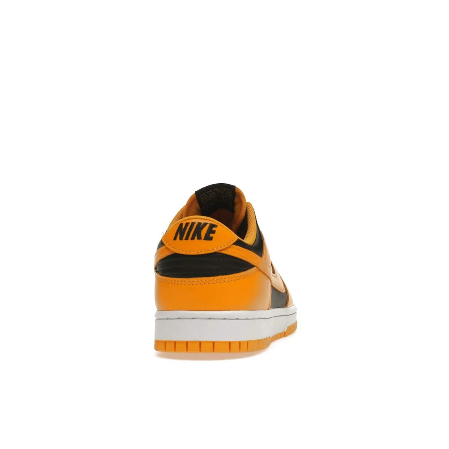 Nike Dunk Low Championship Goldenrod (2021) - Image 29 - Only at www.BallersClubKickz.com - Iconic silhouette Nike Dunk Low is back with a luxe look. Featuring a black upper, goldenrod overlays, and white and yellow Nike Air sole, this retro inspired design is perfect for the sneaker culture enthusiast. Releasing in December 2021 at $100.