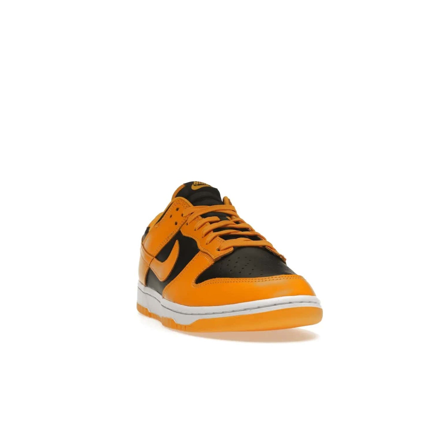 Nike Dunk Low Championship Goldenrod (2021) - Image 8 - Only at www.BallersClubKickz.com - Iconic silhouette Nike Dunk Low is back with a luxe look. Featuring a black upper, goldenrod overlays, and white and yellow Nike Air sole, this retro inspired design is perfect for the sneaker culture enthusiast. Releasing in December 2021 at $100.
