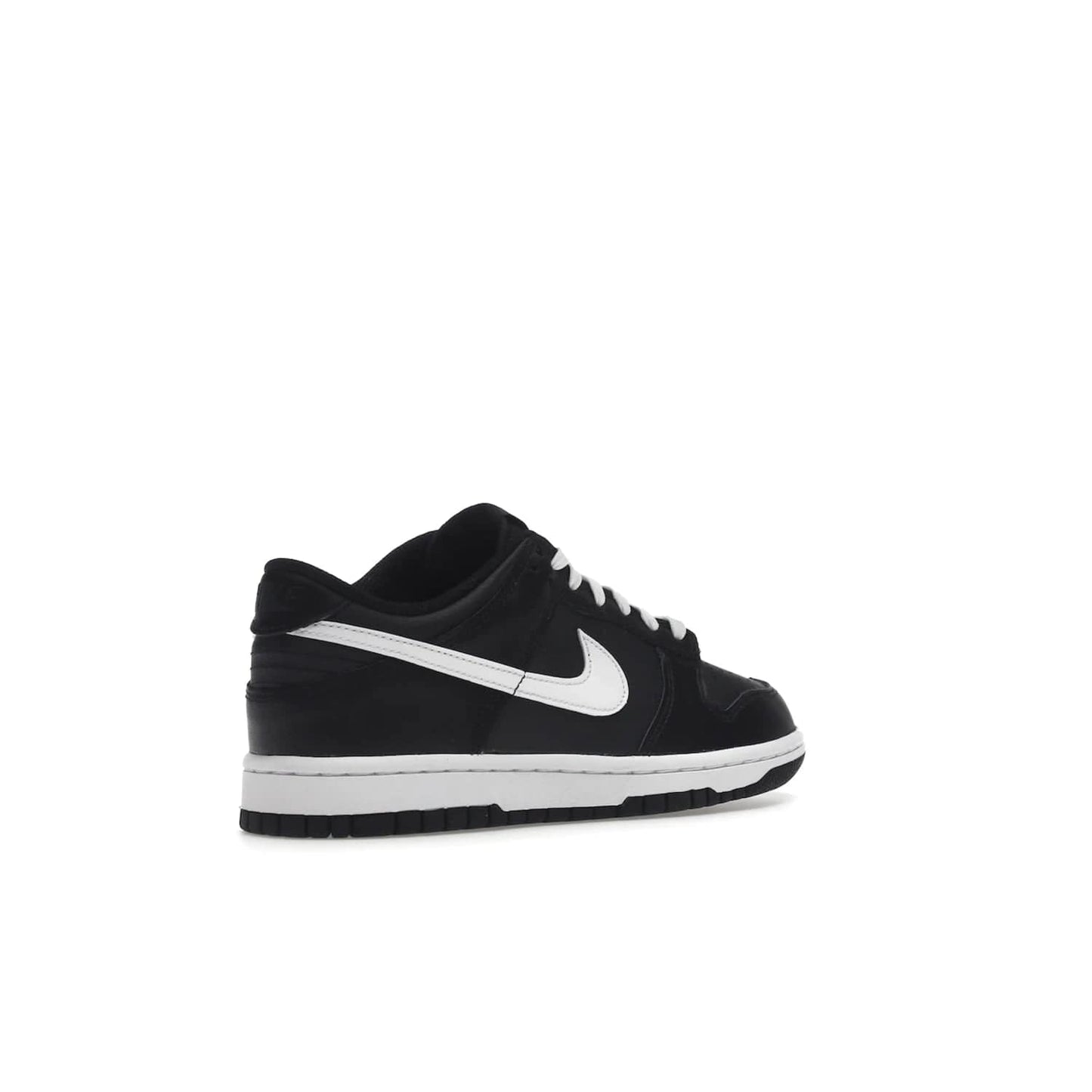Nike Dunk Low Black White (2022) (GS) - Image 33 - Only at www.BallersClubKickz.com - A classic two-tone upper of black & off white, low profile midsole, and patterned rubber outsole make the Nike Dunk Low Black White 2022 GS perfect for any style. Get the complete look and release date on July 12, 2022.