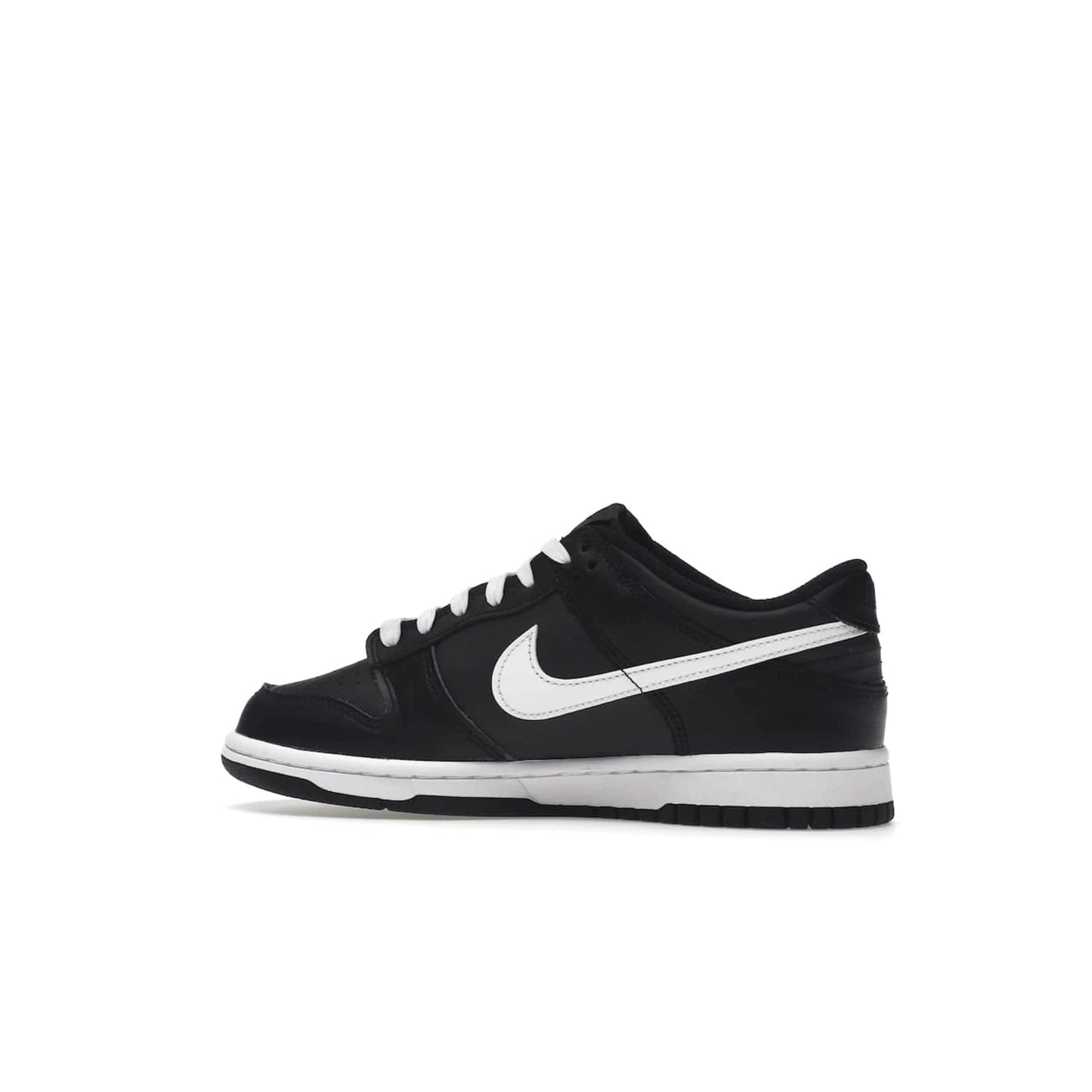 Nike Dunk Low Black White (2022) (GS) - Image 21 - Only at www.BallersClubKickz.com - A classic two-tone upper of black & off white, low profile midsole, and patterned rubber outsole make the Nike Dunk Low Black White 2022 GS perfect for any style. Get the complete look and release date on July 12, 2022.