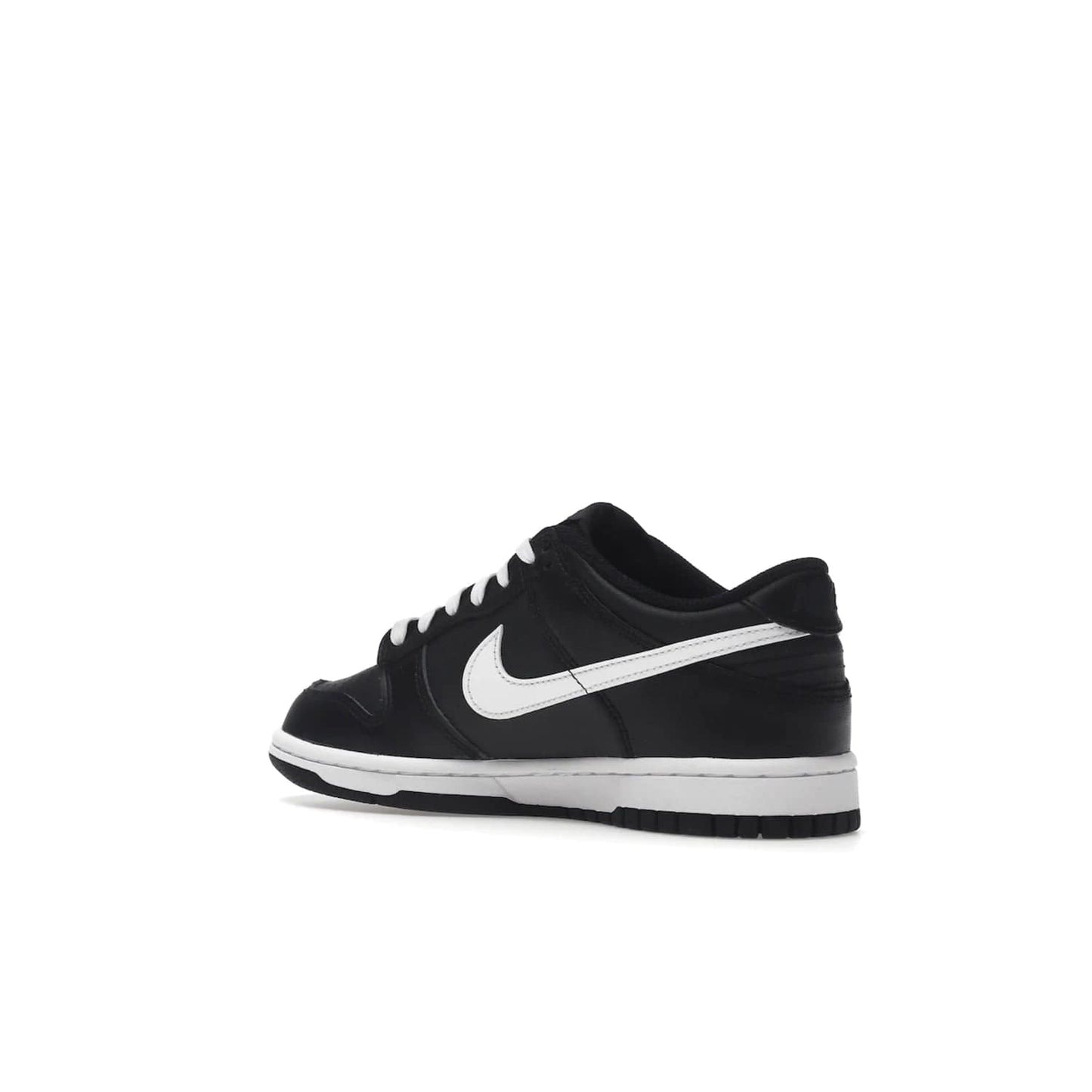 Nike Dunk Low Black White (2022) (GS) - Image 23 - Only at www.BallersClubKickz.com - A classic two-tone upper of black & off white, low profile midsole, and patterned rubber outsole make the Nike Dunk Low Black White 2022 GS perfect for any style. Get the complete look and release date on July 12, 2022.