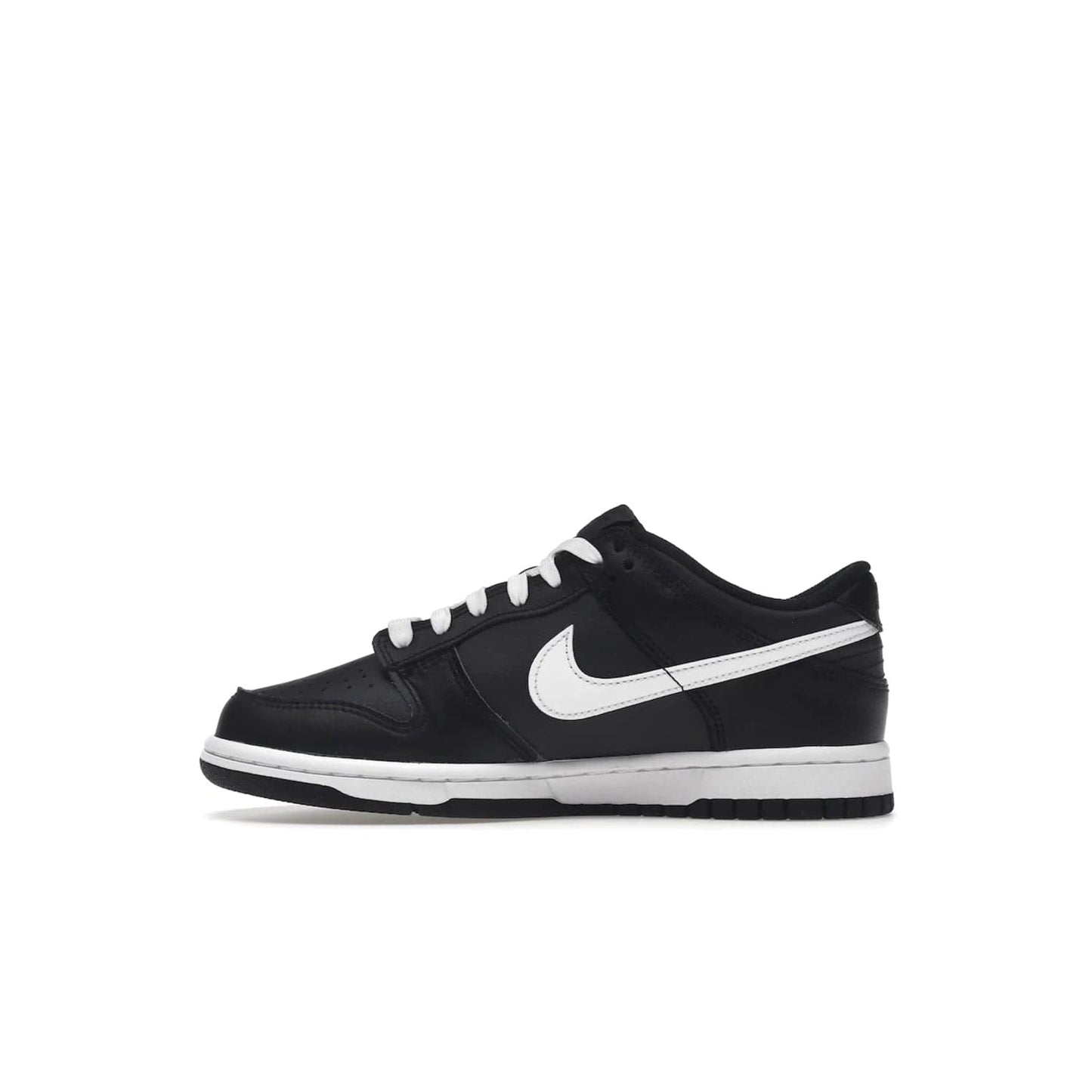 Nike Dunk Low Black White (2022) (GS) - Image 19 - Only at www.BallersClubKickz.com - A classic two-tone upper of black & off white, low profile midsole, and patterned rubber outsole make the Nike Dunk Low Black White 2022 GS perfect for any style. Get the complete look and release date on July 12, 2022.
