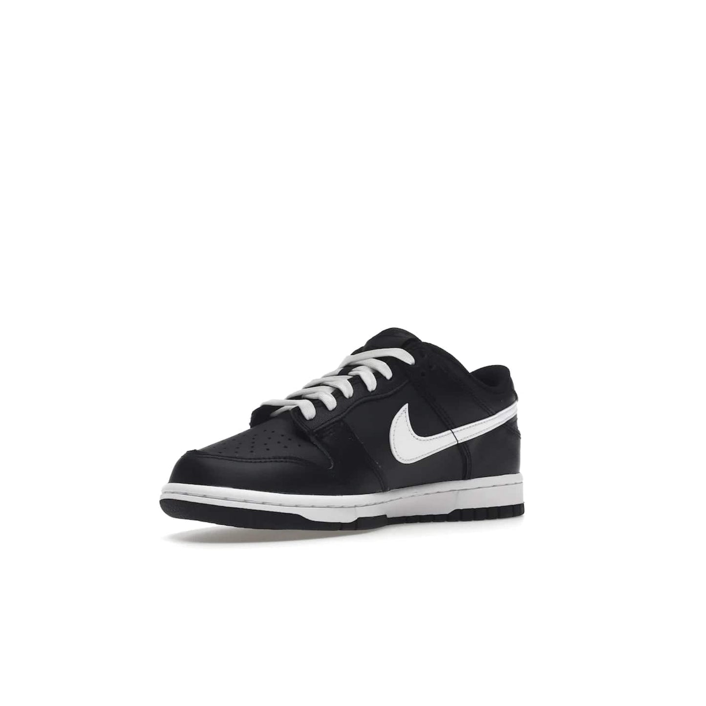 Nike Dunk Low Black White (2022) (GS) - Image 15 - Only at www.BallersClubKickz.com - A classic two-tone upper of black & off white, low profile midsole, and patterned rubber outsole make the Nike Dunk Low Black White 2022 GS perfect for any style. Get the complete look and release date on July 12, 2022.