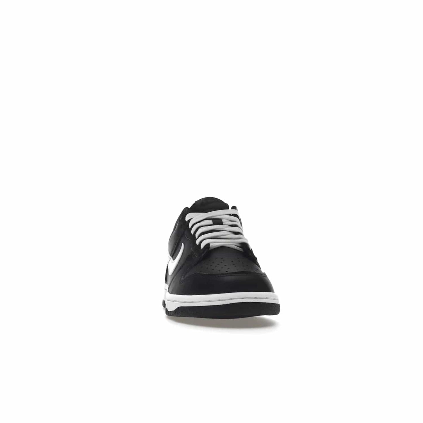 Nike Dunk Low Black White (2022) (GS) - Image 9 - Only at www.BallersClubKickz.com - A classic two-tone upper of black & off white, low profile midsole, and patterned rubber outsole make the Nike Dunk Low Black White 2022 GS perfect for any style. Get the complete look and release date on July 12, 2022.