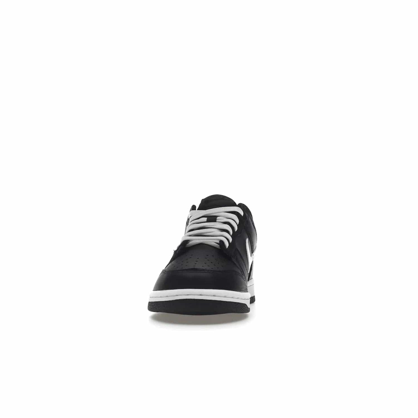 Nike Dunk Low Black White (2022) (GS) - Image 11 - Only at www.BallersClubKickz.com - A classic two-tone upper of black & off white, low profile midsole, and patterned rubber outsole make the Nike Dunk Low Black White 2022 GS perfect for any style. Get the complete look and release date on July 12, 2022.