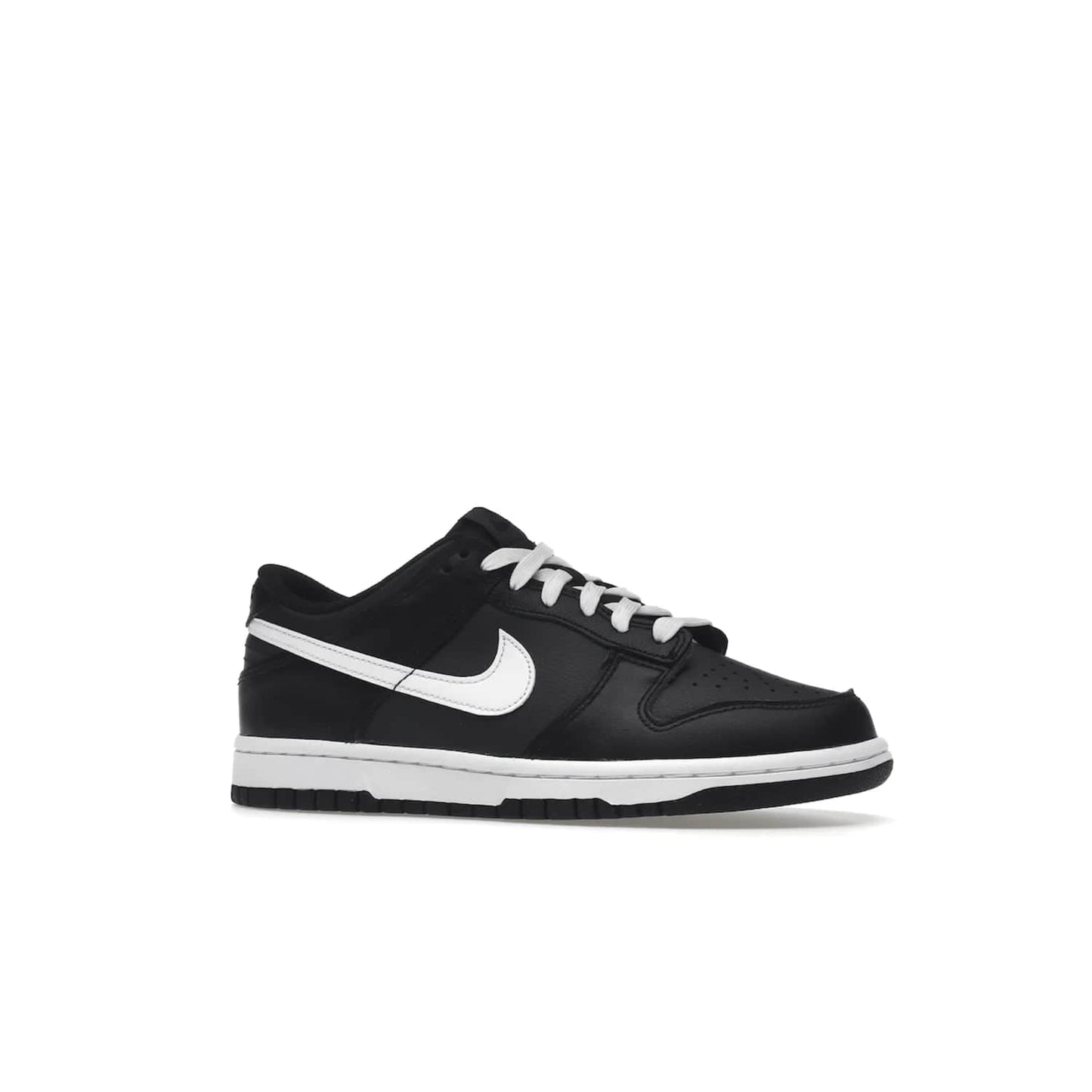 Nike Dunk Low Black White (2022) (GS) - Image 3 - Only at www.BallersClubKickz.com - A classic two-tone upper of black & off white, low profile midsole, and patterned rubber outsole make the Nike Dunk Low Black White 2022 GS perfect for any style. Get the complete look and release date on July 12, 2022.