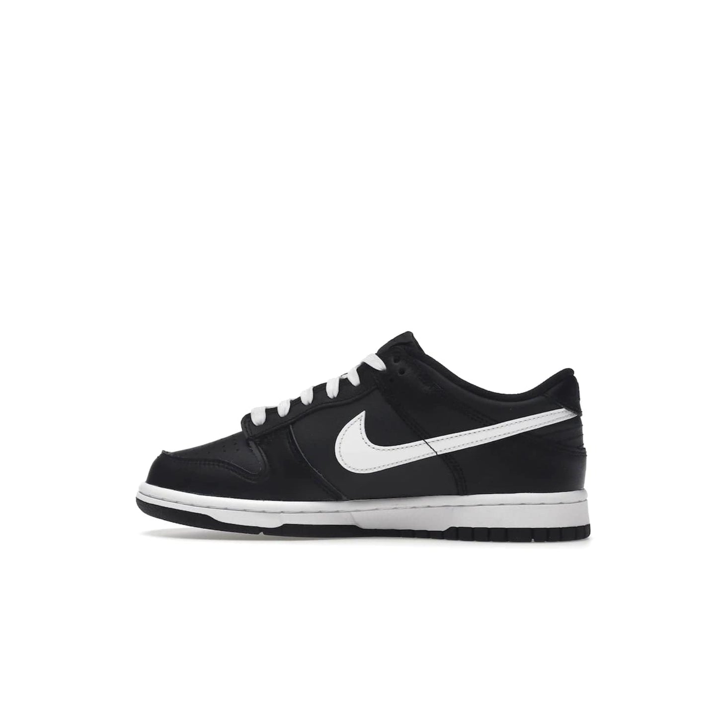 Nike Dunk Low Black White (2022) (GS) - Image 20 - Only at www.BallersClubKickz.com - A classic two-tone upper of black & off white, low profile midsole, and patterned rubber outsole make the Nike Dunk Low Black White 2022 GS perfect for any style. Get the complete look and release date on July 12, 2022.