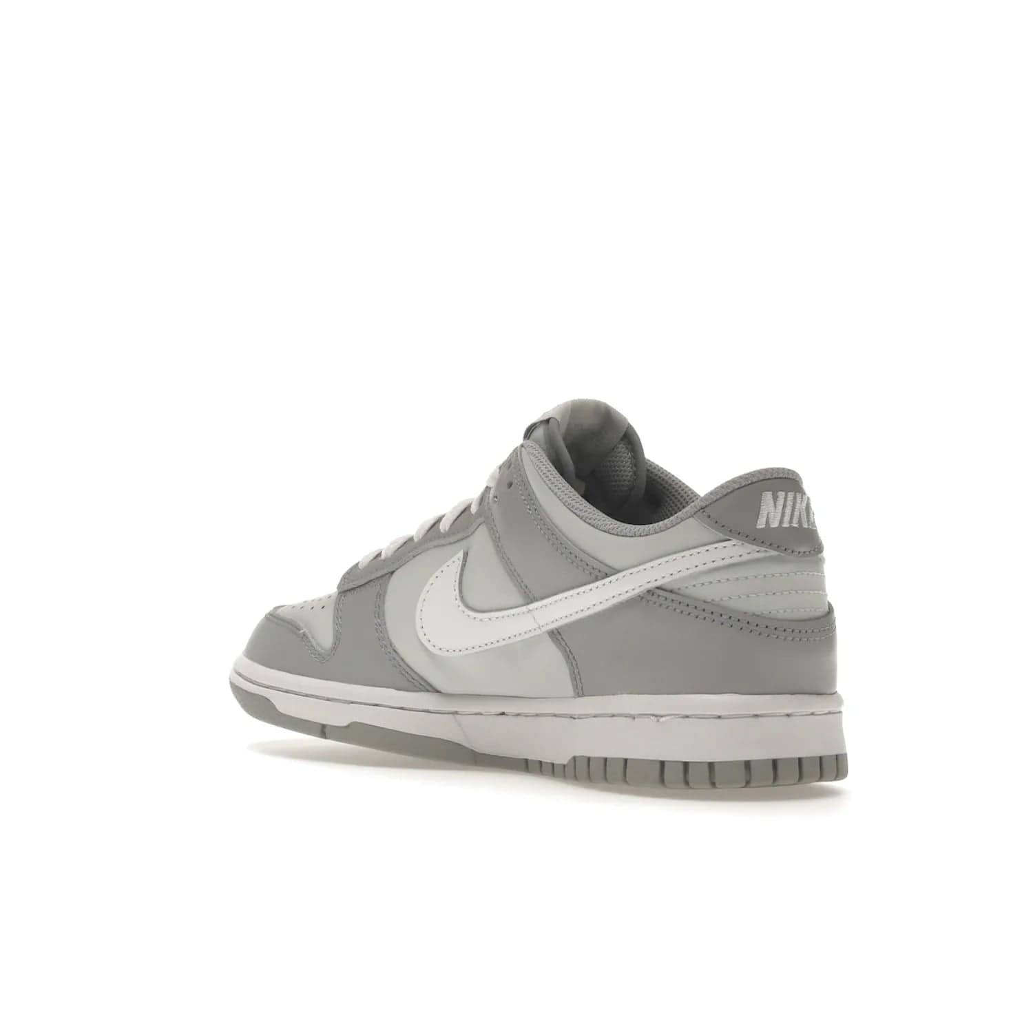 Nike Dunk Low Two-Toned Grey (GS) - Image 24 - Only at www.BallersClubKickz.com - Stylish Nike Dunk Low GS Two-Toned Grey featuring leather build, light/dark grey shades, white Swoosh logo & gray rubber outsole. Get ready to make a statement with this timeless classic released in March 2022.