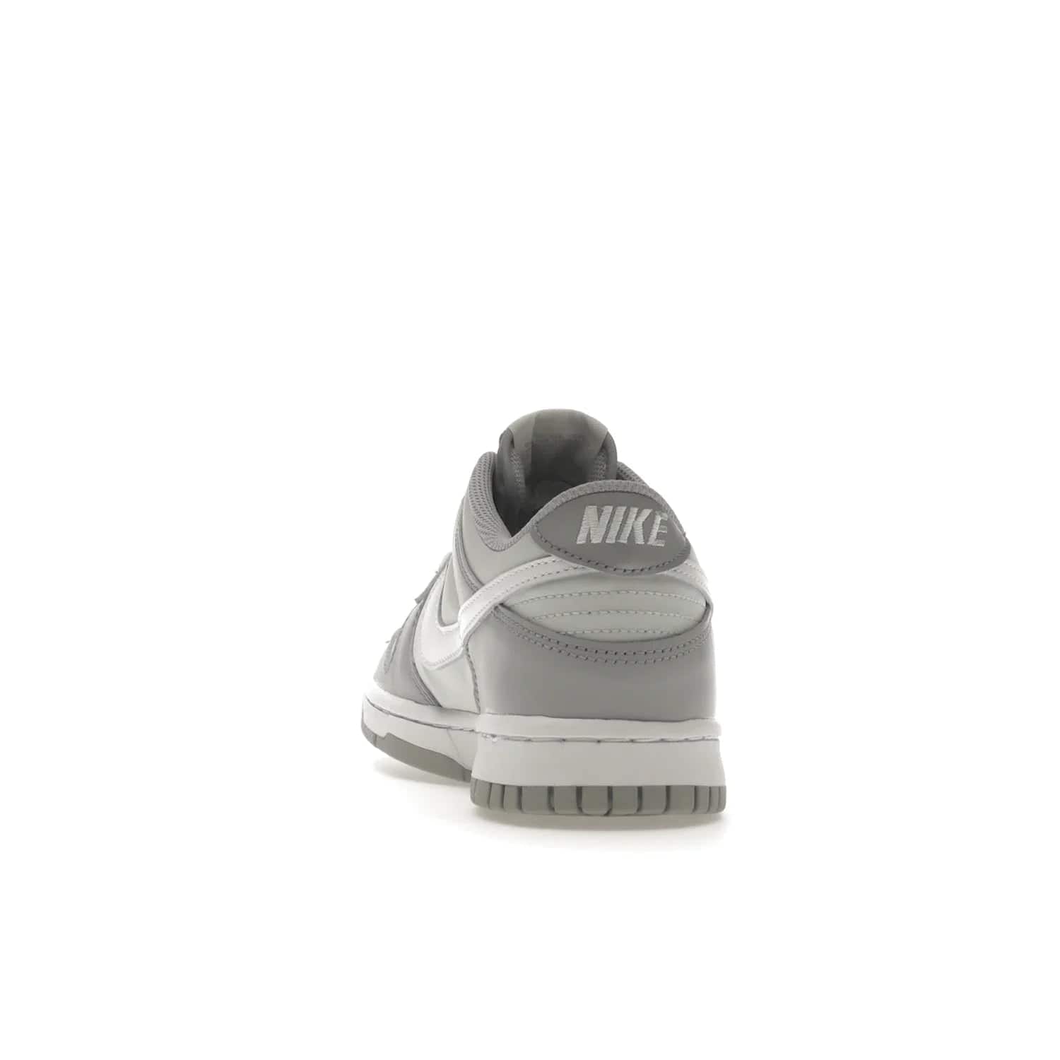 Nike Dunk Low Two-Toned Grey (GS) - Image 27 - Only at www.BallersClubKickz.com - Stylish Nike Dunk Low GS Two-Toned Grey featuring leather build, light/dark grey shades, white Swoosh logo & gray rubber outsole. Get ready to make a statement with this timeless classic released in March 2022.