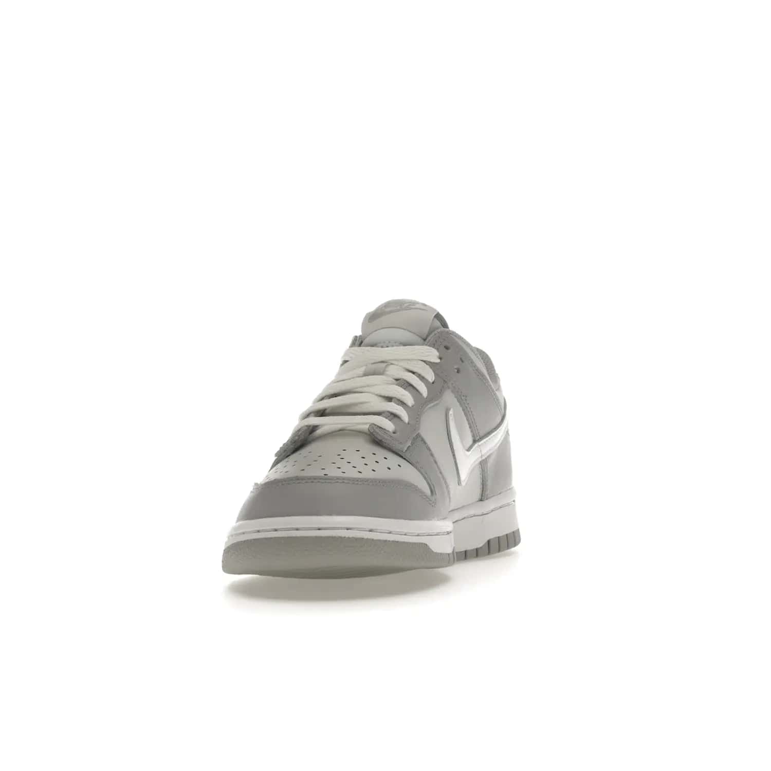 Nike Dunk Low Two-Toned Grey (GS) - Image 12 - Only at www.BallersClubKickz.com - Stylish Nike Dunk Low GS Two-Toned Grey featuring leather build, light/dark grey shades, white Swoosh logo & gray rubber outsole. Get ready to make a statement with this timeless classic released in March 2022.