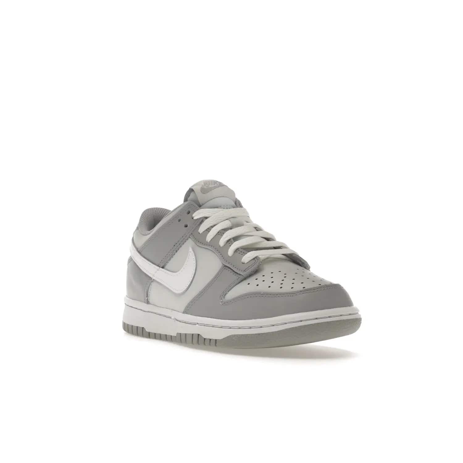 Nike Dunk Low Two-Toned Grey (GS) - Image 7 - Only at www.BallersClubKickz.com - Stylish Nike Dunk Low GS Two-Toned Grey featuring leather build, light/dark grey shades, white Swoosh logo & gray rubber outsole. Get ready to make a statement with this timeless classic released in March 2022.
