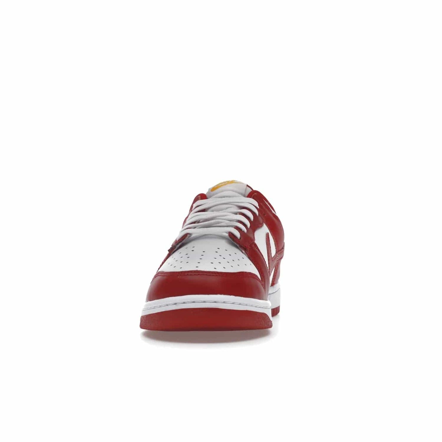 Nike Dunk Low USC - Image 11 - Only at www.BallersClubKickz.com - The Nike Dunk Low USC DD1391-602 colorway captures the eye of University of Southern California fans. Crafted with leather and rubber upper and outsole, this stylish sneaker features a white, gym red, and yellow colorway. With yellow Nike branding, white perforated vamp, and red suede Swoosh, this sneaker turns heads. Get the classic Nike Dunk Low USC releasing on November 9th, 2022.