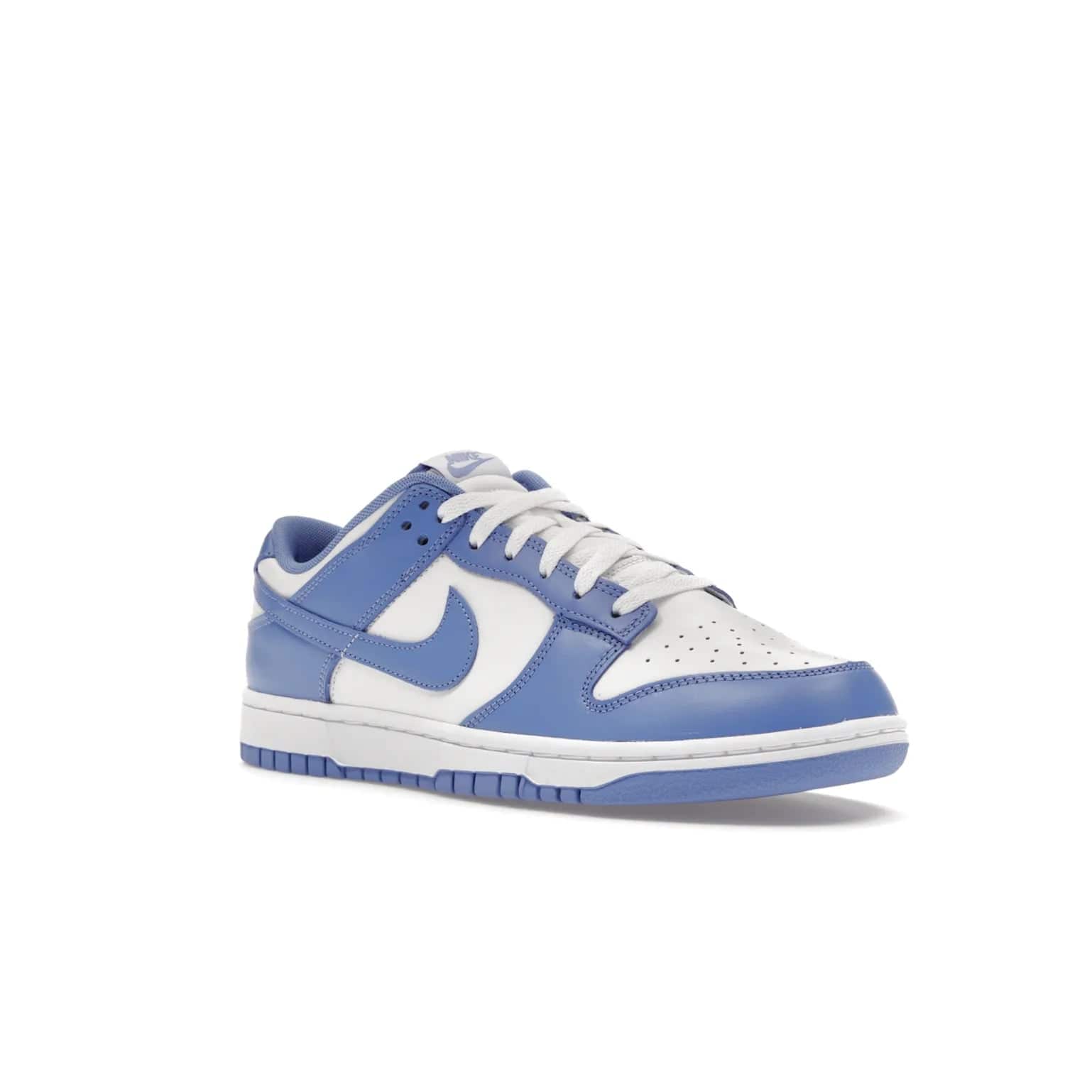 Nike Dunk Low Polar Blue - Image 5 - Only at www.BallersClubKickz.com - The Nike Dunk Low in Polar Blue combines streetwear and basketball style with leather uppers and white and Polar Blue overlays. Features include a rubber outsole, Nike Swoosh, white branding, and a padded tongue. Perfect for sports, casual, or everyday wear. On sale October 14th, 2023.