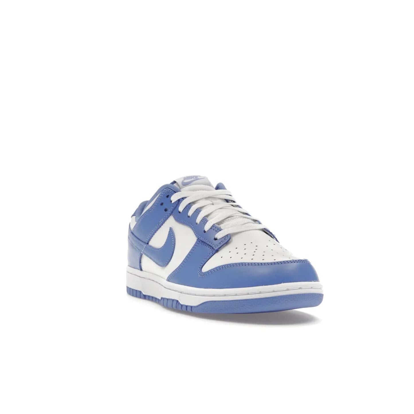 Nike Dunk Low Polar Blue - Image 7 - Only at www.BallersClubKickz.com - The Nike Dunk Low in Polar Blue combines streetwear and basketball style with leather uppers and white and Polar Blue overlays. Features include a rubber outsole, Nike Swoosh, white branding, and a padded tongue. Perfect for sports, casual, or everyday wear. On sale October 14th, 2023.