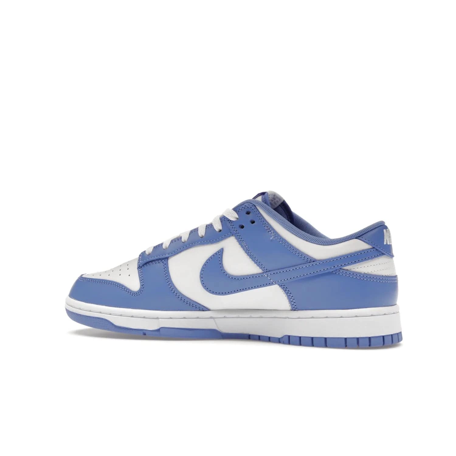 Nike Dunk Low Polar Blue - Image 21 - Only at www.BallersClubKickz.com - The Nike Dunk Low in Polar Blue combines streetwear and basketball style with leather uppers and white and Polar Blue overlays. Features include a rubber outsole, Nike Swoosh, white branding, and a padded tongue. Perfect for sports, casual, or everyday wear. On sale October 14th, 2023.