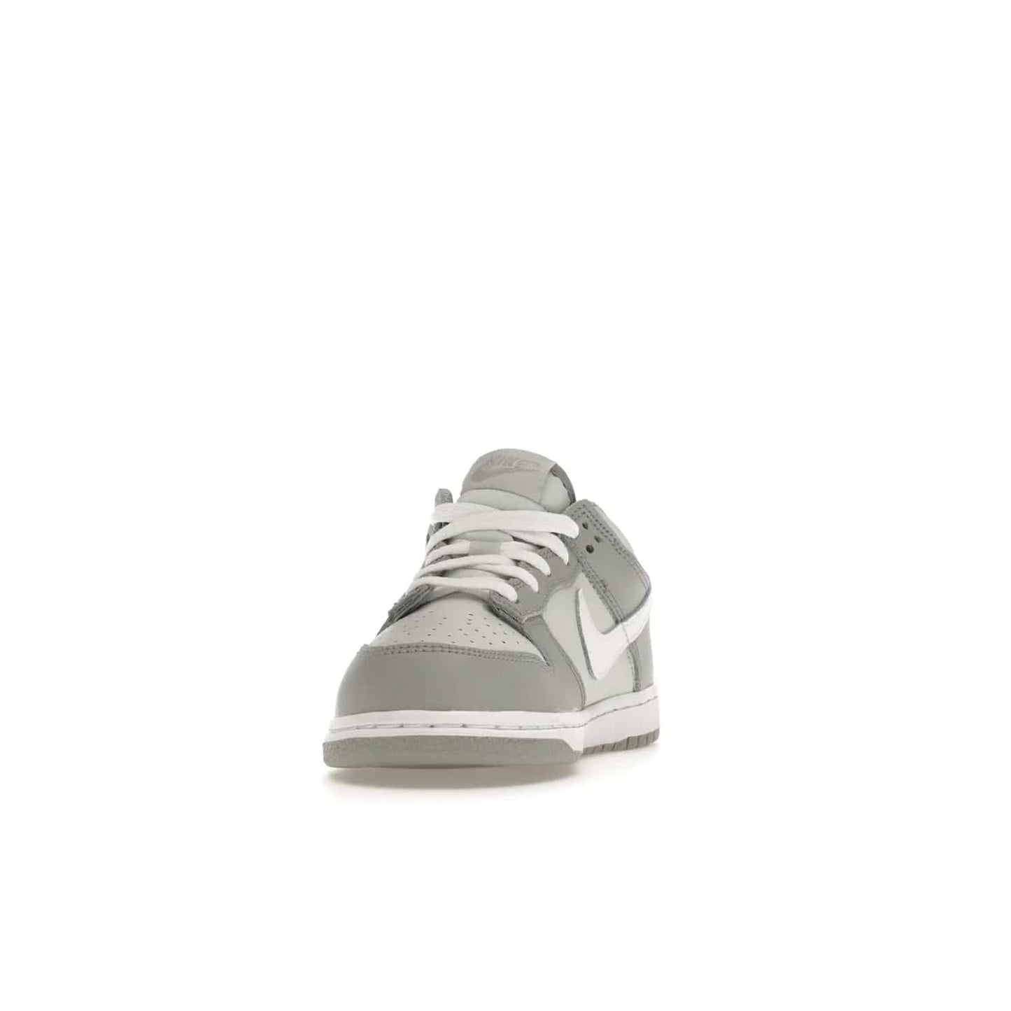 Nike Dunk Low Two-Toned Grey (PS) - Image 12 - Only at www.BallersClubKickz.com - Classic Nike style for your little one with the Nike Dunk Low Two-Toned Grey (Preschool). White laces, white tongue, white leather swoosh, grey sole & midsole, and patches of grey leather are timeless classics. Released March 2022 for comfort & style.