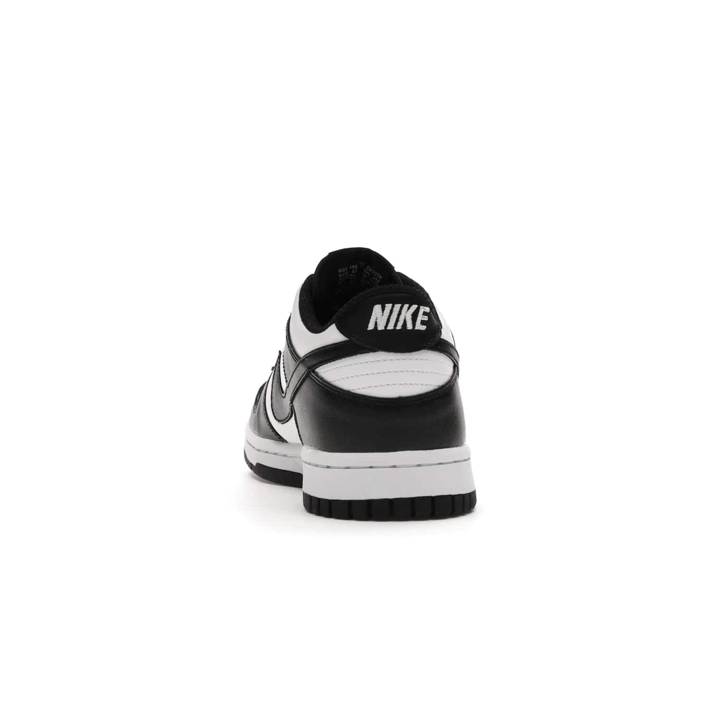 Nike Dunk Low Retro White Black Panda (2021) (GS) - Image 27 - Only at www.BallersClubKickz.com - Upgrade your style with the Nike Dunk Low Retro White Black (GS). Featuring premium leather, iconic Nike text, signature Swoosh logo and striking black/white colorway, this striking silhouette is the perfect mix of style and comfort. Colorway released in March 2021.
