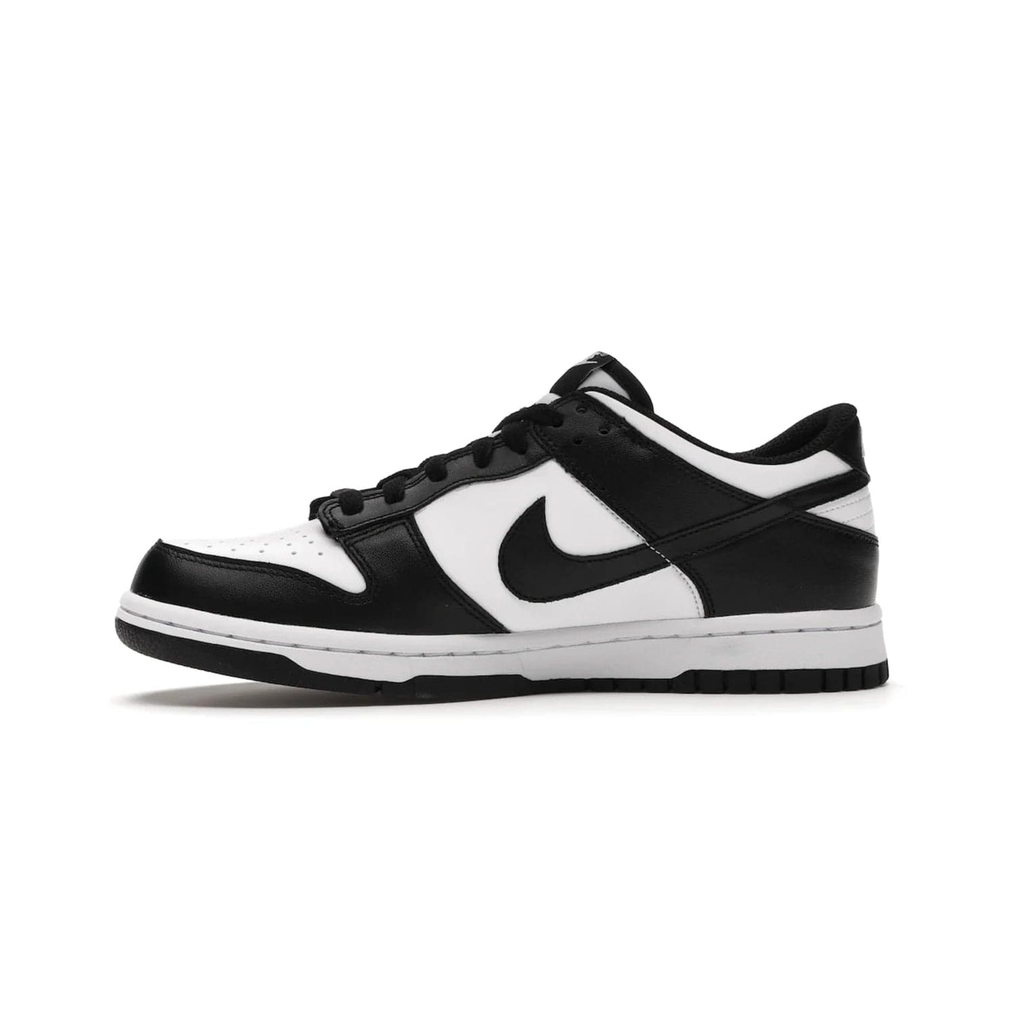 Nike Dunk Low Retro White Black Panda (2021) (GS) - Image 18 - Only at www.BallersClubKickz.com - Upgrade your style with the Nike Dunk Low Retro White Black (GS). Featuring premium leather, iconic Nike text, signature Swoosh logo and striking black/white colorway, this striking silhouette is the perfect mix of style and comfort. Colorway released in March 2021.
