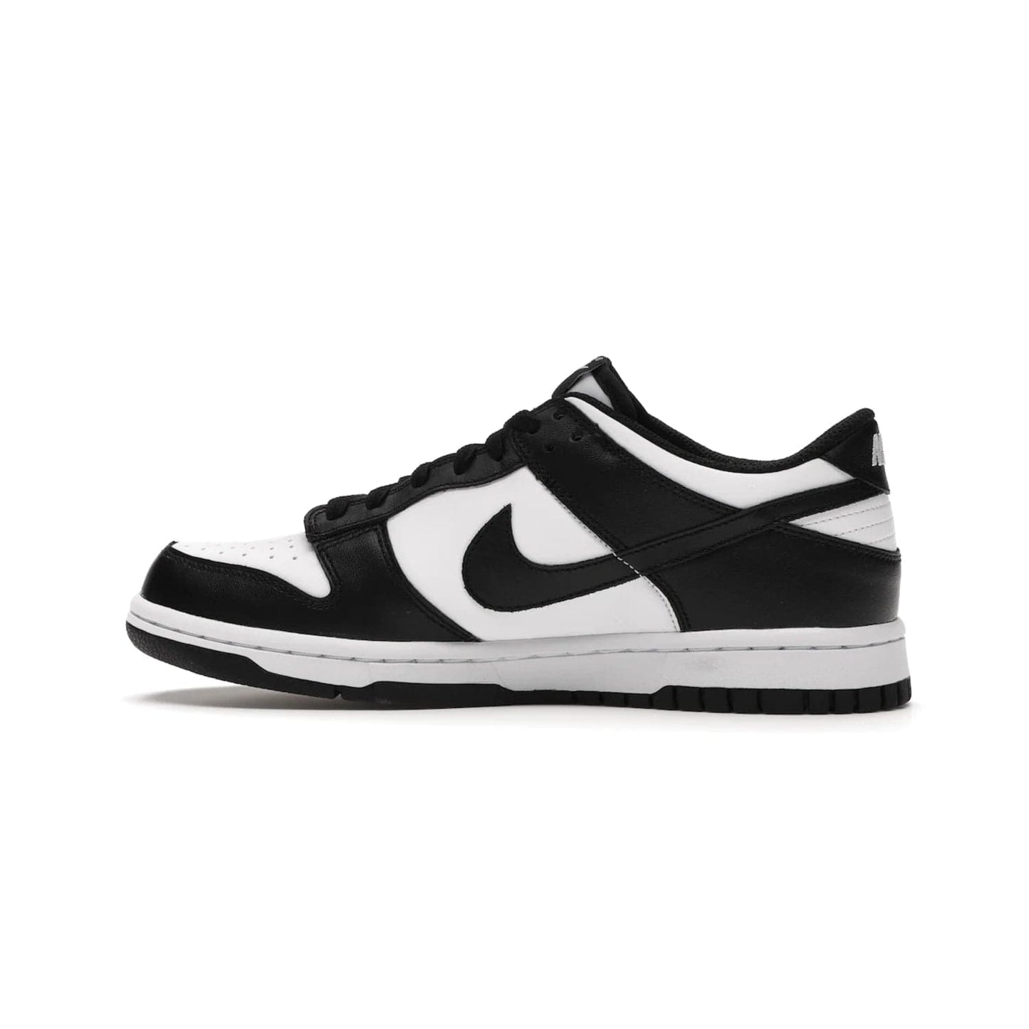 Nike Dunk Low Retro White Black Panda (2021) (GS) - Image 20 - Only at www.BallersClubKickz.com - Upgrade your style with the Nike Dunk Low Retro White Black (GS). Featuring premium leather, iconic Nike text, signature Swoosh logo and striking black/white colorway, this striking silhouette is the perfect mix of style and comfort. Colorway released in March 2021.