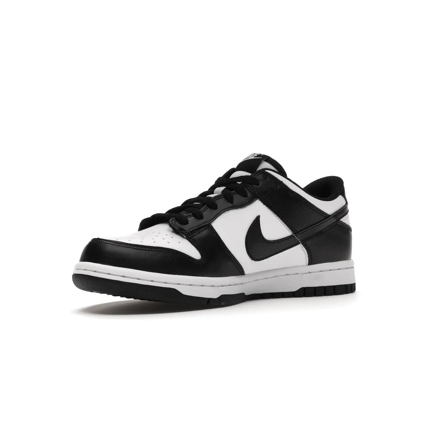 Nike Dunk Low Retro White Black Panda (2021) (GS) - Image 15 - Only at www.BallersClubKickz.com - Upgrade your style with the Nike Dunk Low Retro White Black (GS). Featuring premium leather, iconic Nike text, signature Swoosh logo and striking black/white colorway, this striking silhouette is the perfect mix of style and comfort. Colorway released in March 2021.