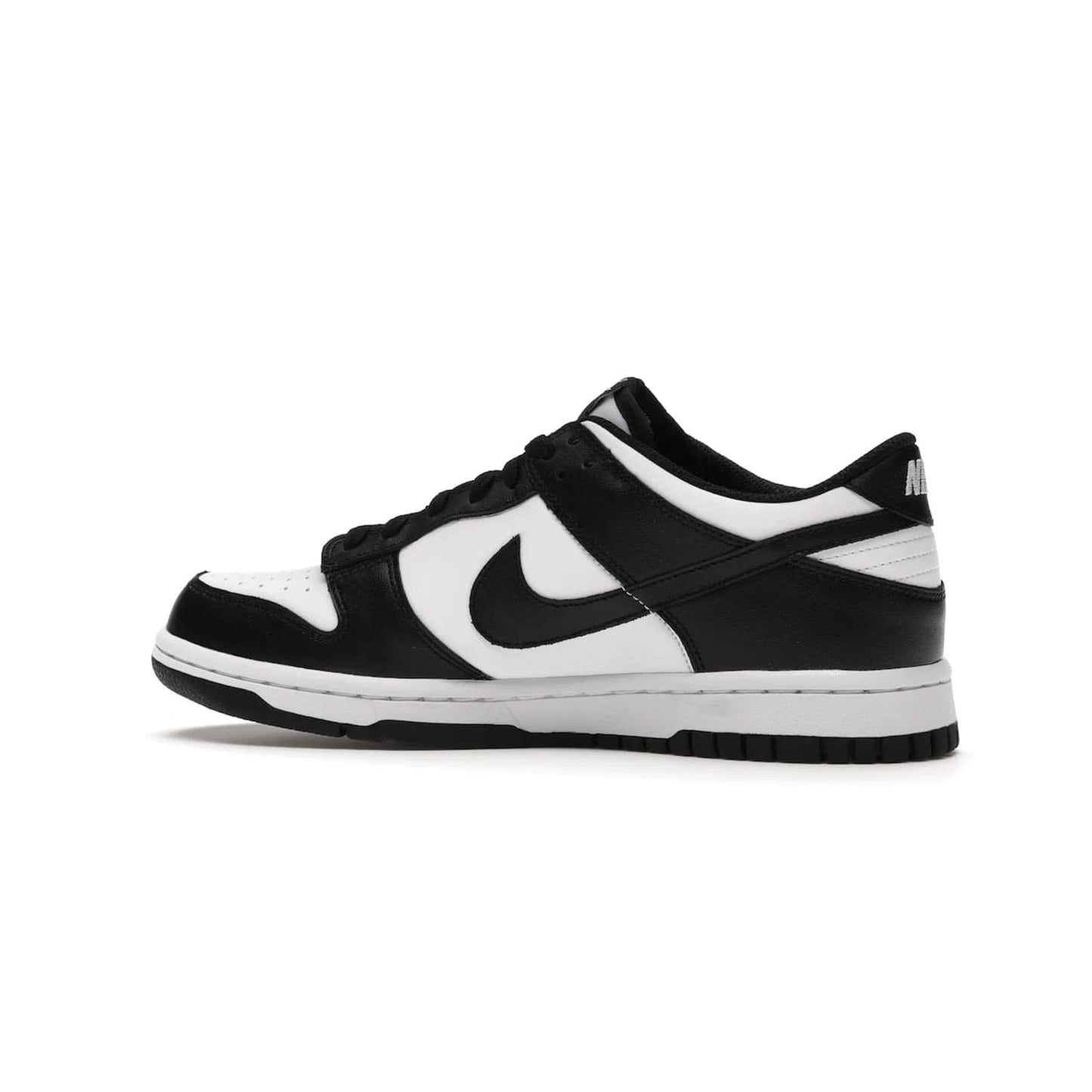 Nike Dunk Low Retro White Black Panda (2021) (GS) - Image 21 - Only at www.BallersClubKickz.com - Upgrade your style with the Nike Dunk Low Retro White Black (GS). Featuring premium leather, iconic Nike text, signature Swoosh logo and striking black/white colorway, this striking silhouette is the perfect mix of style and comfort. Colorway released in March 2021.