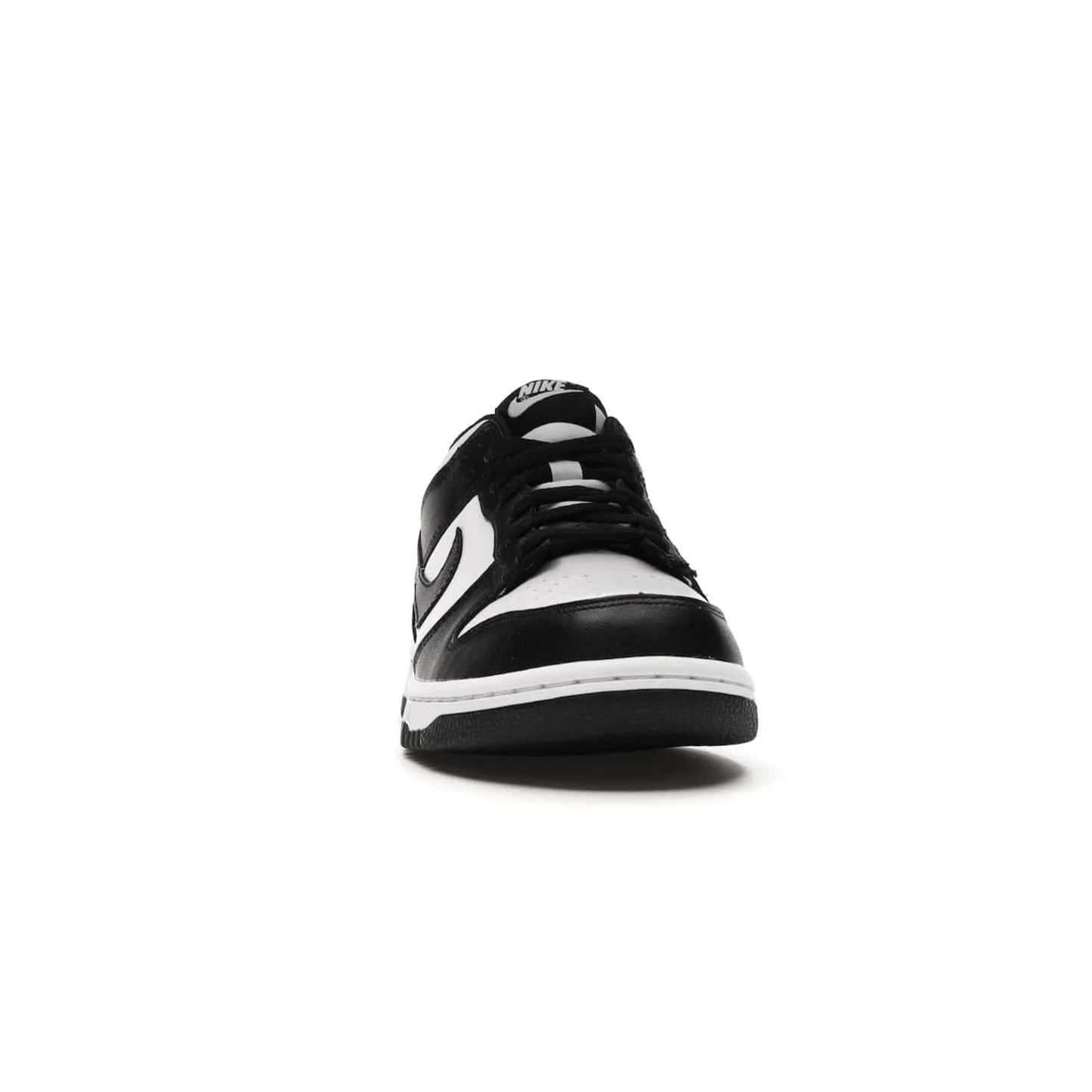 Nike Dunk Low Retro White Black Panda (2021) (GS) - Image 9 - Only at www.BallersClubKickz.com - Upgrade your style with the Nike Dunk Low Retro White Black (GS). Featuring premium leather, iconic Nike text, signature Swoosh logo and striking black/white colorway, this striking silhouette is the perfect mix of style and comfort. Colorway released in March 2021.