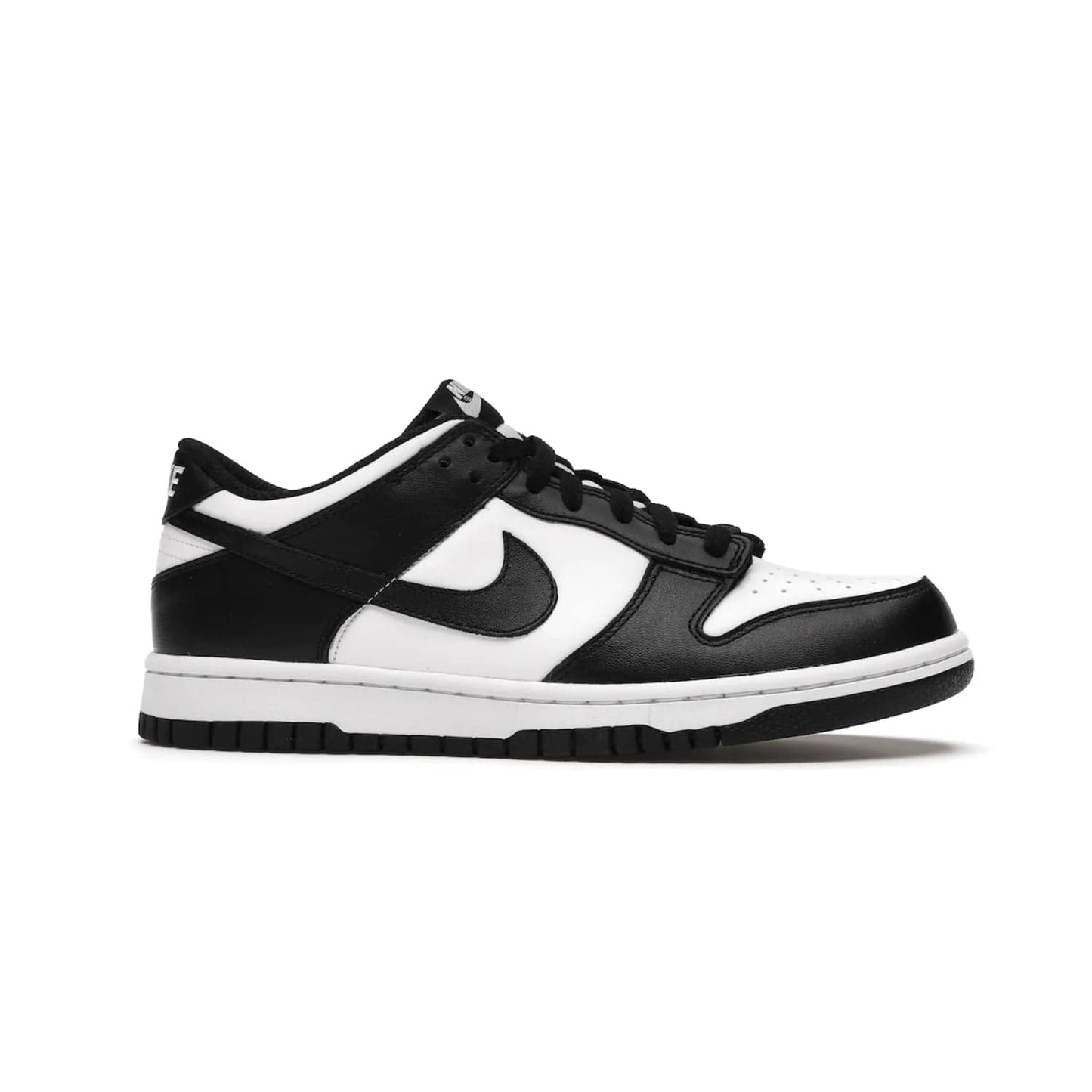Nike Dunk Low Retro White Black Panda (2021) (GS) - Image 2 - Only at www.BallersClubKickz.com - Upgrade your style with the Nike Dunk Low Retro White Black (GS). Featuring premium leather, iconic Nike text, signature Swoosh logo and striking black/white colorway, this striking silhouette is the perfect mix of style and comfort. Colorway released in March 2021.