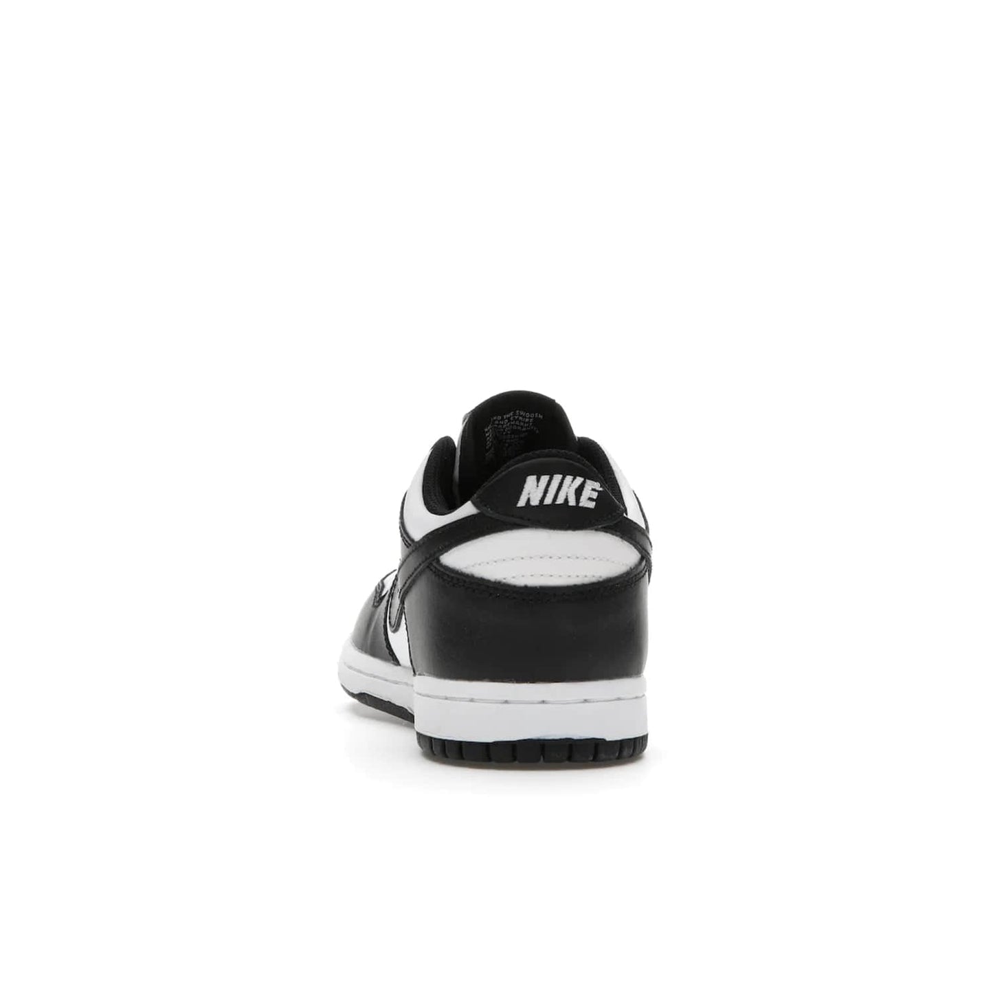 Nike Dunk Low Retro White Black Panda (2021) (PS) - Image 27 - Only at www.BallersClubKickz.com - Retro basketball style with modern updates: Nike Dunk Low PS White/Black. Find the classic sneaker with all-white leather upper, black overlays, black Swoosh branding an more. Originally released in March 2021.