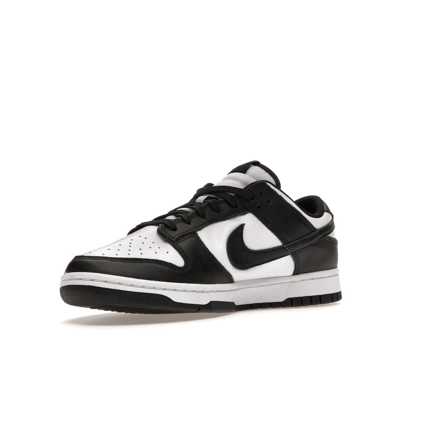 Nike Dunk Low Retro White Black Panda (2021) - Image 15 - Only at www.BallersClubKickz.com - Shop the Nike Dunk Low Retro White Black for classic styling featuring white leather with black leather overlays and classic Nike branding. Released in 2021, this timeless design offers a white midsole and black outsole for a stylish look. Shop all the Nike Dunks & rock this classic look.
