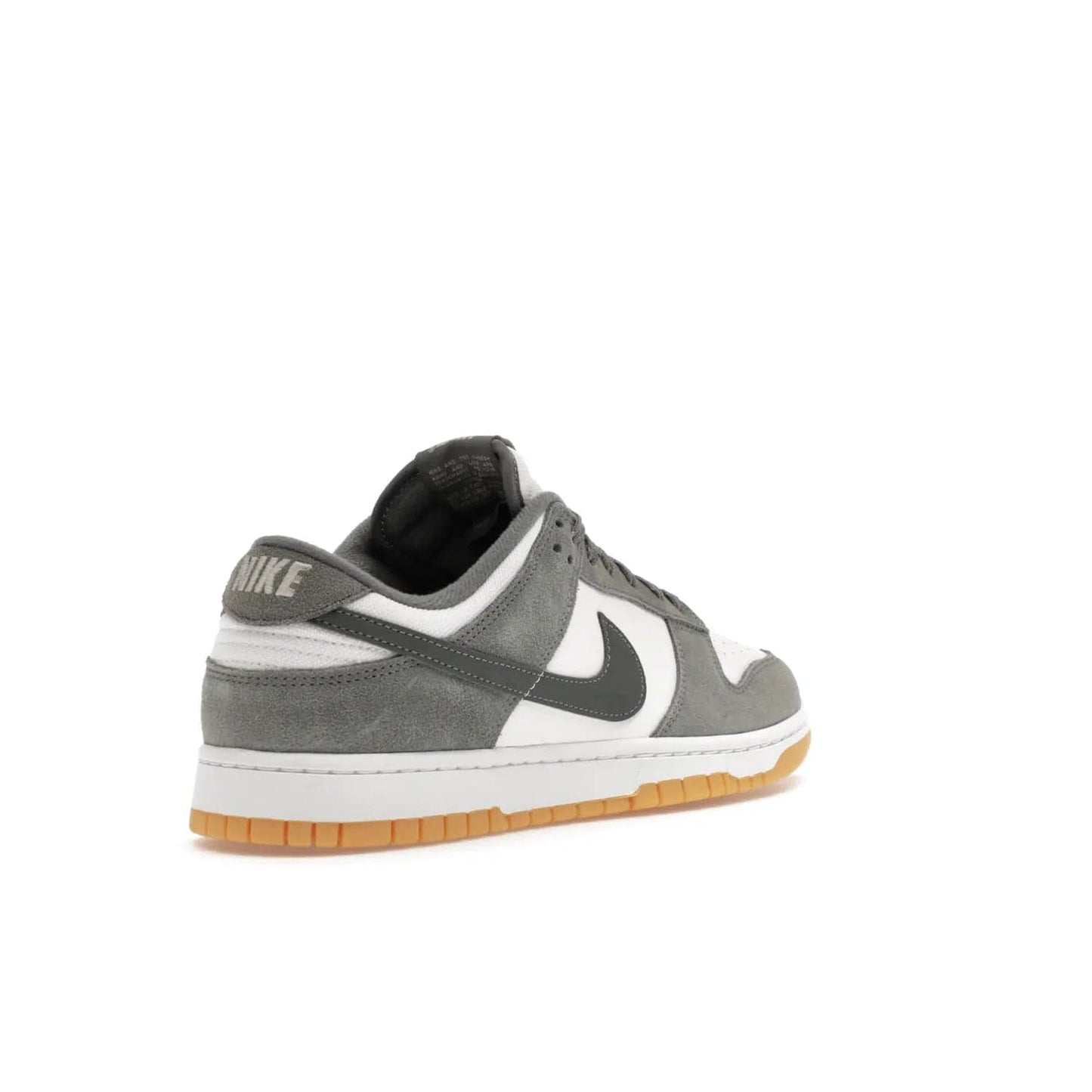 Nike Dunk Low Smoke Grey Gum 3M Swoosh - Image 32 - Only at www.BallersClubKickz.com - Introducing the Nike Dunk Low "Smoke Grey Gum 3M Swoosh". A stylish low-top sneaker with a white canvas-textile base and gum light brown outsole. Get the modern update with the bold "Smoke Grey" 3M swoosh. Available on October 3, 2023 at select Nike retailers.