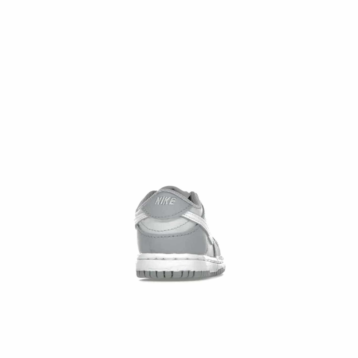 Nike Dunk Low Two-Toned Grey (TD) - Image 29 - Only at www.BallersClubKickz.com - Clean and sharp Nike Dunk Low Two-Toned Grey (TD) release on March 1, 2022. Pure Platinum and White-Wolf Grey design with extra-cushioned midsole for optimal comfort and style.