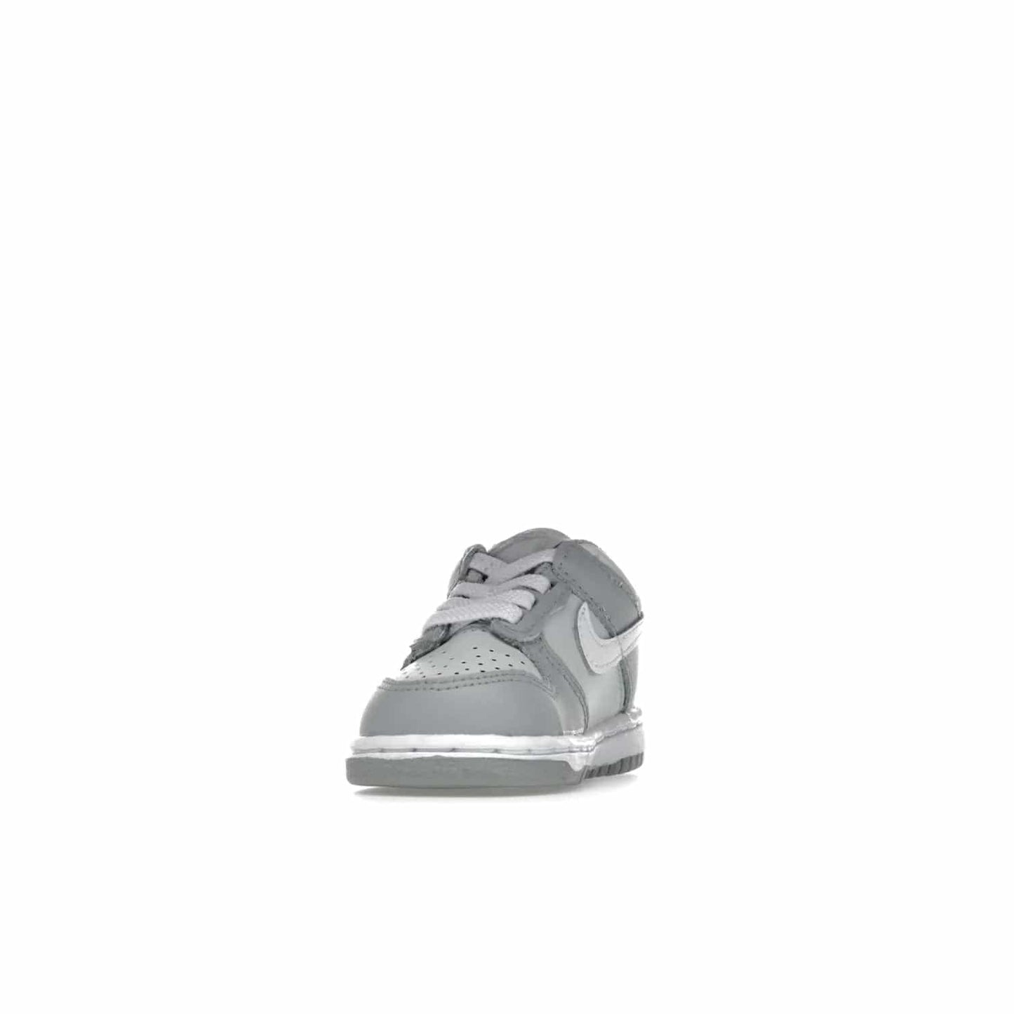 Nike Dunk Low Two-Toned Grey (TD) - Image 12 - Only at www.BallersClubKickz.com - Clean and sharp Nike Dunk Low Two-Toned Grey (TD) release on March 1, 2022. Pure Platinum and White-Wolf Grey design with extra-cushioned midsole for optimal comfort and style.